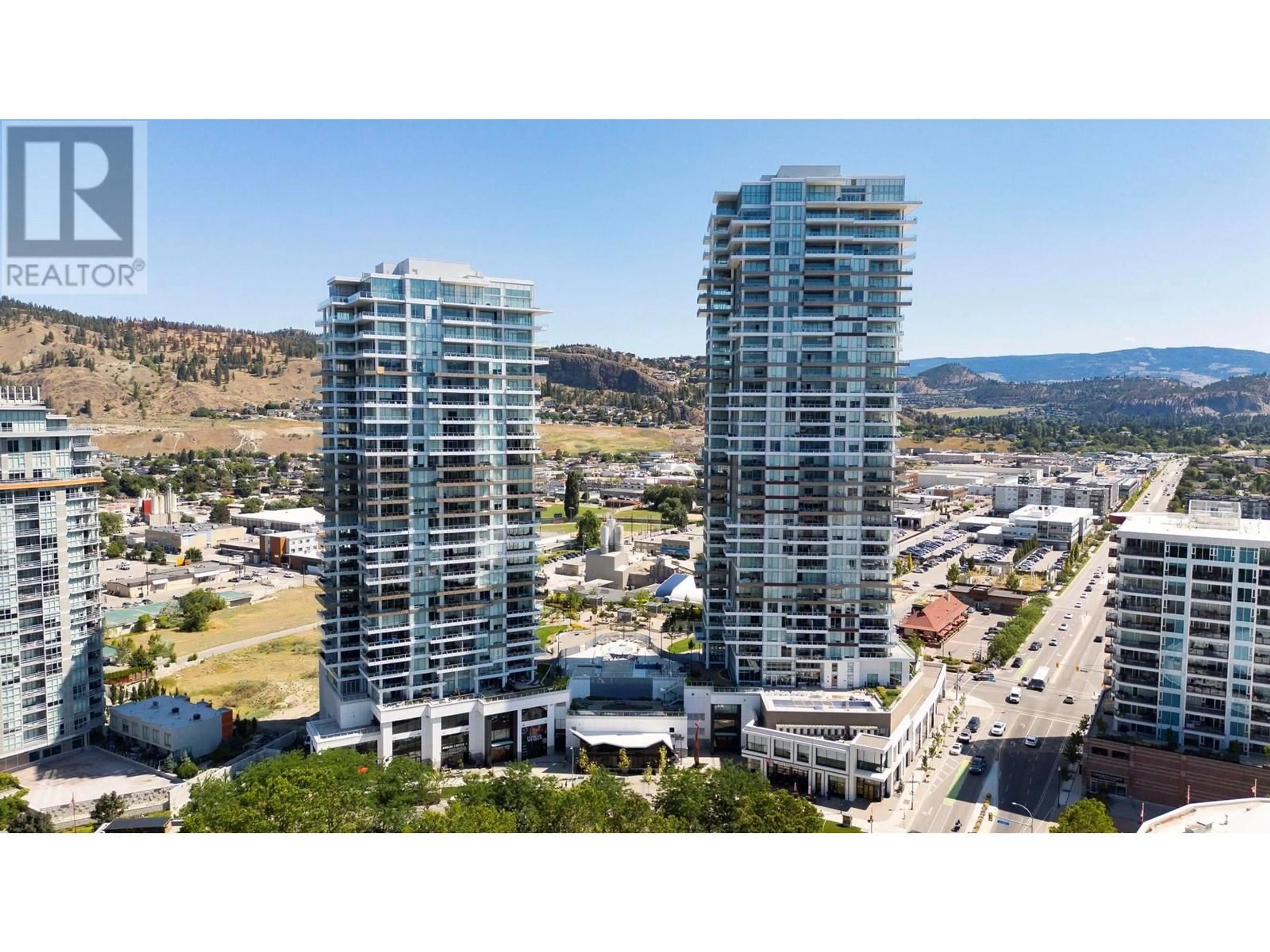 A pic from exterior of the house or condo, the view of city buildings for 1181 SUNSET Drive Unit# 1306, Kelowna British Columbia V1Y0L4