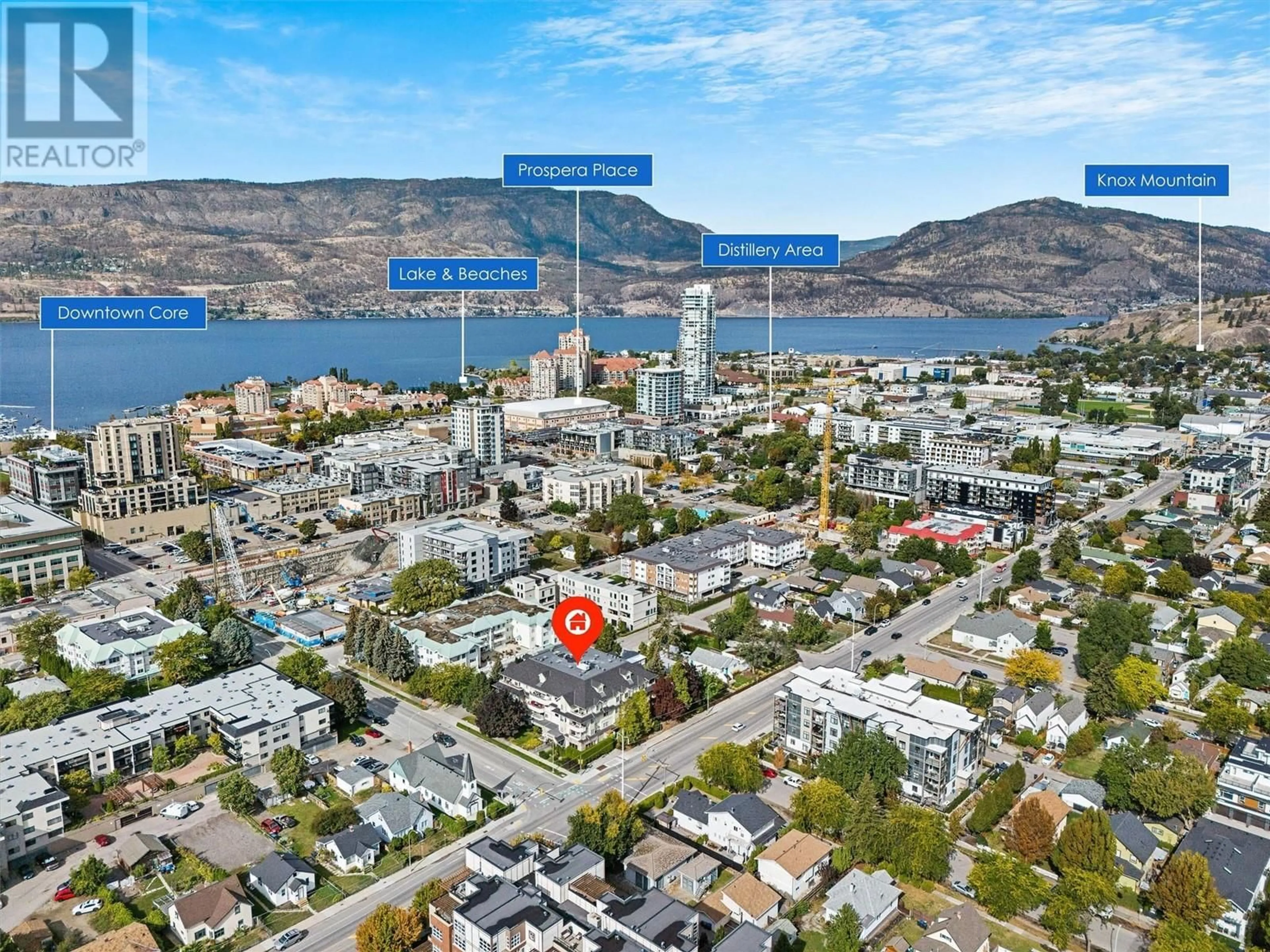 A pic from exterior of the house or condo, the street view for 680 Doyle Avenue Unit# 306, Kelowna British Columbia V1Y9S2