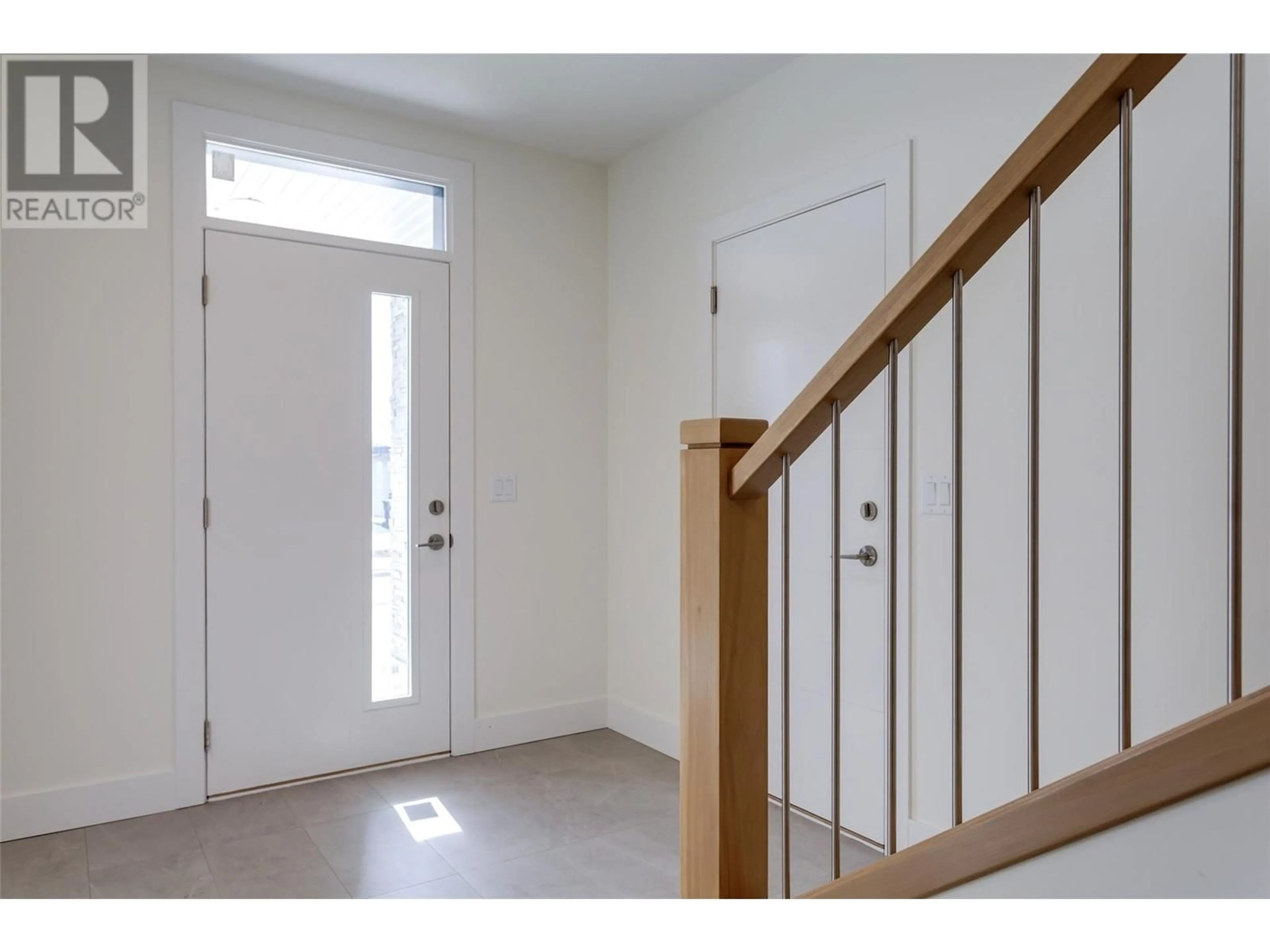 Indoor entryway, wood floors for 2822 Copper Ridge Drive, West Kelowna British Columbia V4T0E7