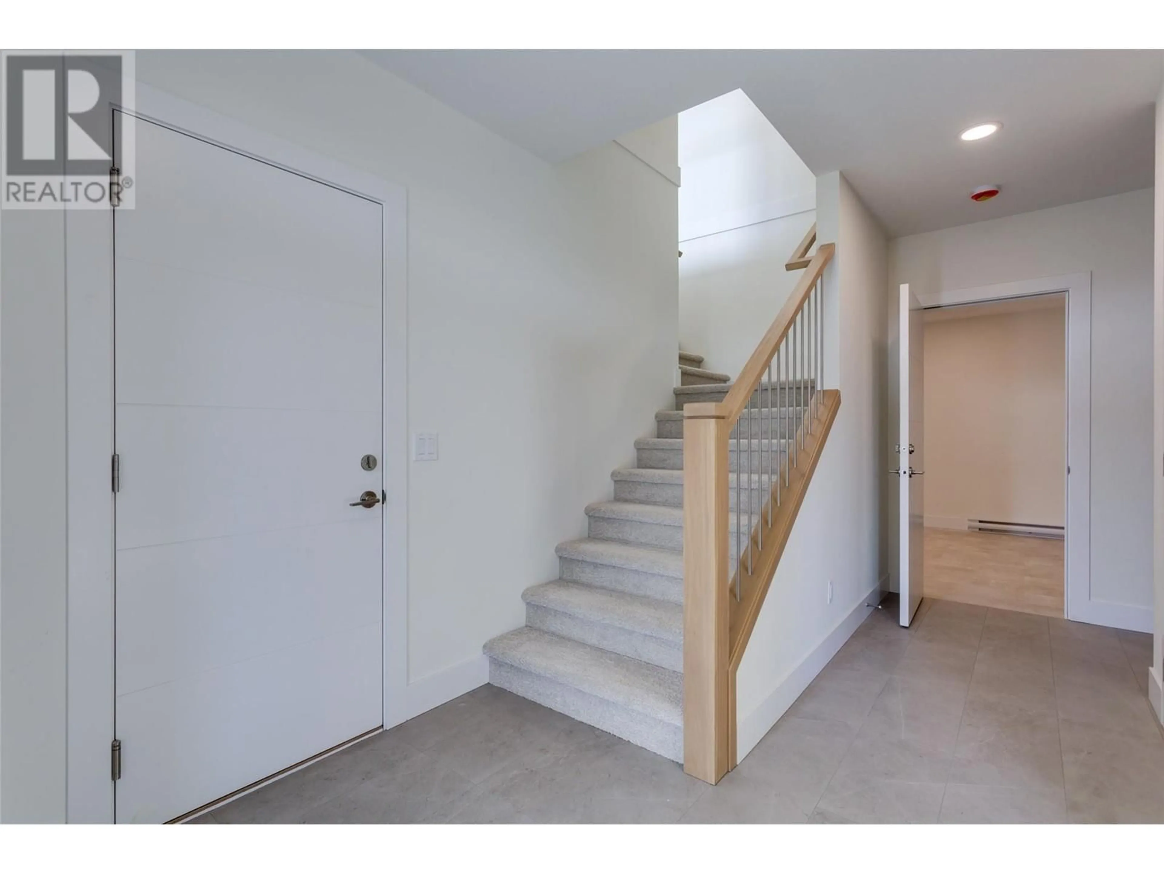 Indoor foyer, cement floor for 2822 Copper Ridge Drive, West Kelowna British Columbia V4T0E7