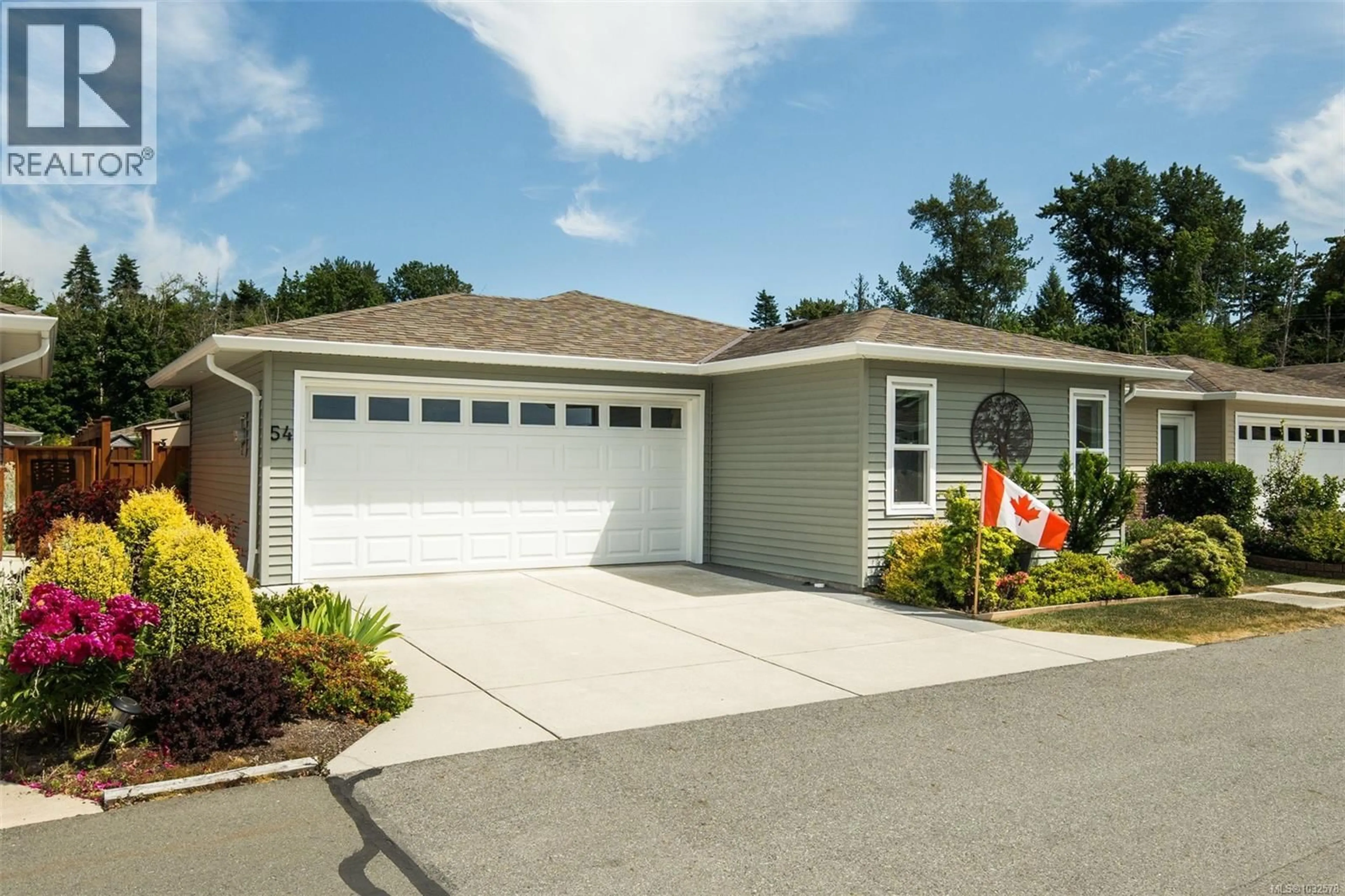 Home with vinyl exterior material, street for 54 - 7586 TETAYUT ROAD, Central Saanich British Columbia V8M0B4