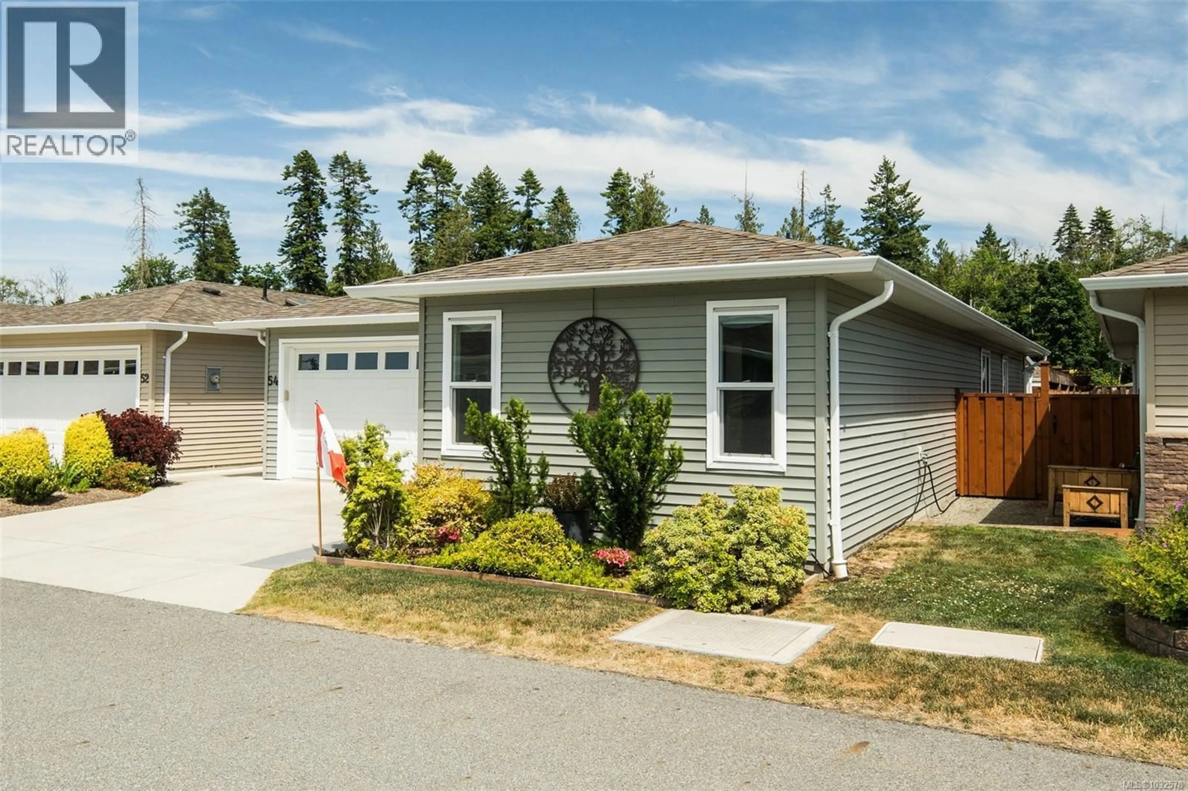 Home with vinyl exterior material, street for 54 - 7586 TETAYUT ROAD, Central Saanich British Columbia V8M0B4