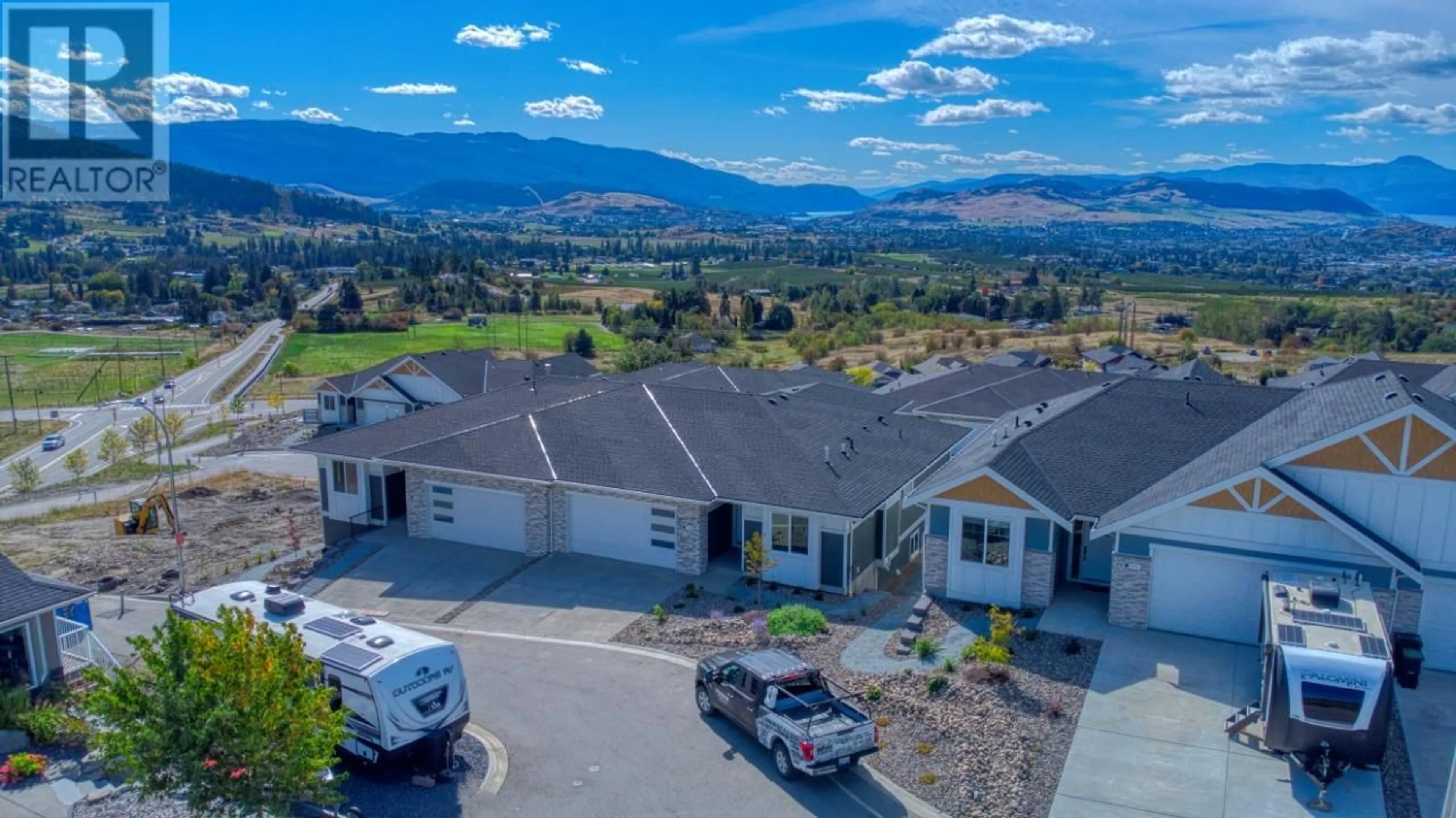 A pic from outside/outdoor area/front of a property/back of a property/a pic from drone, mountain view for 178 WHISTLER PLACE, Vernon British Columbia V1B2Y2