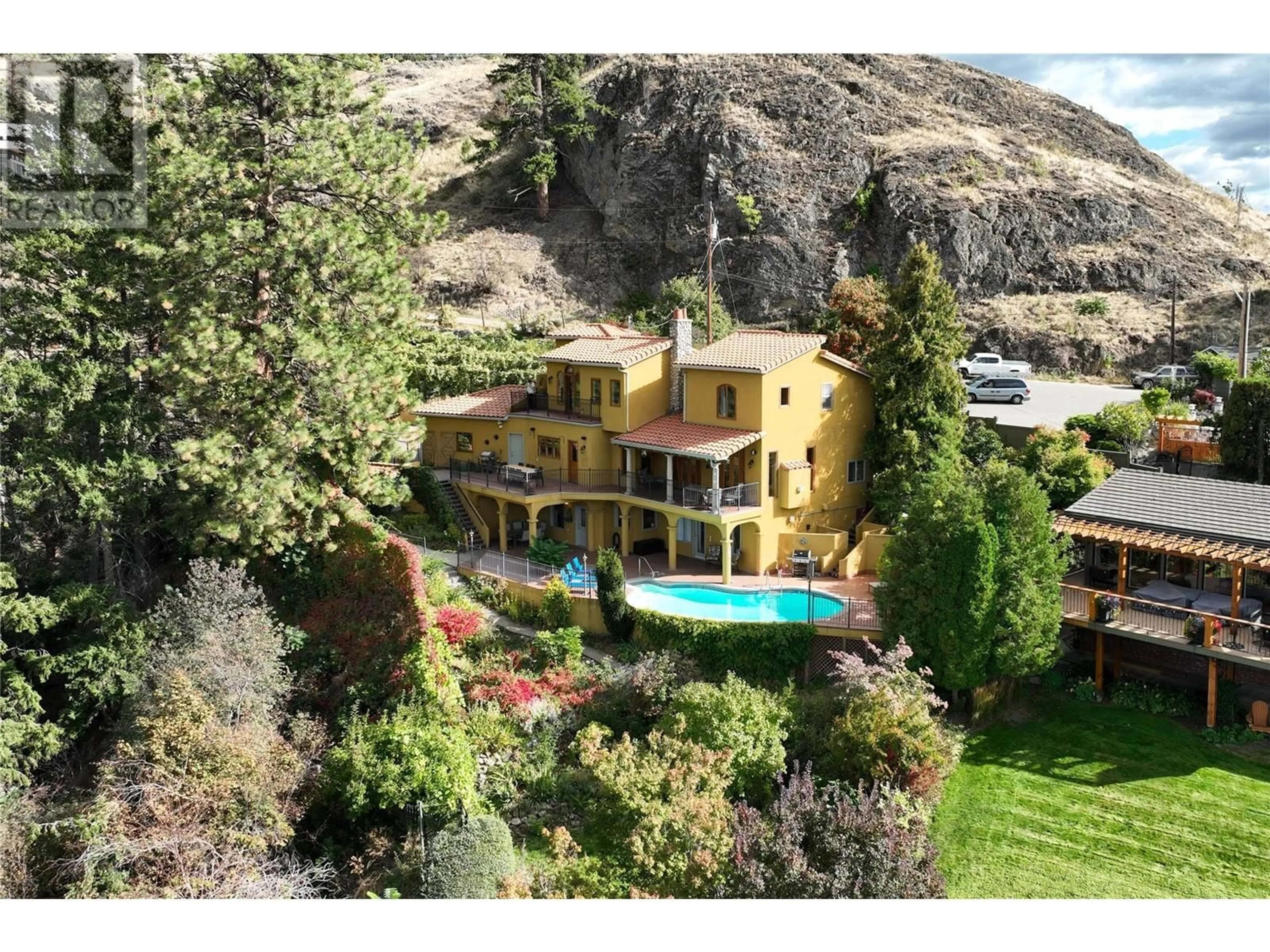 A pic from outside/outdoor area/front of a property/back of a property/a pic from drone, mountain view for 414 HERBERT HEIGHTS ROAD, Kelowna British Columbia V1Y1Y3
