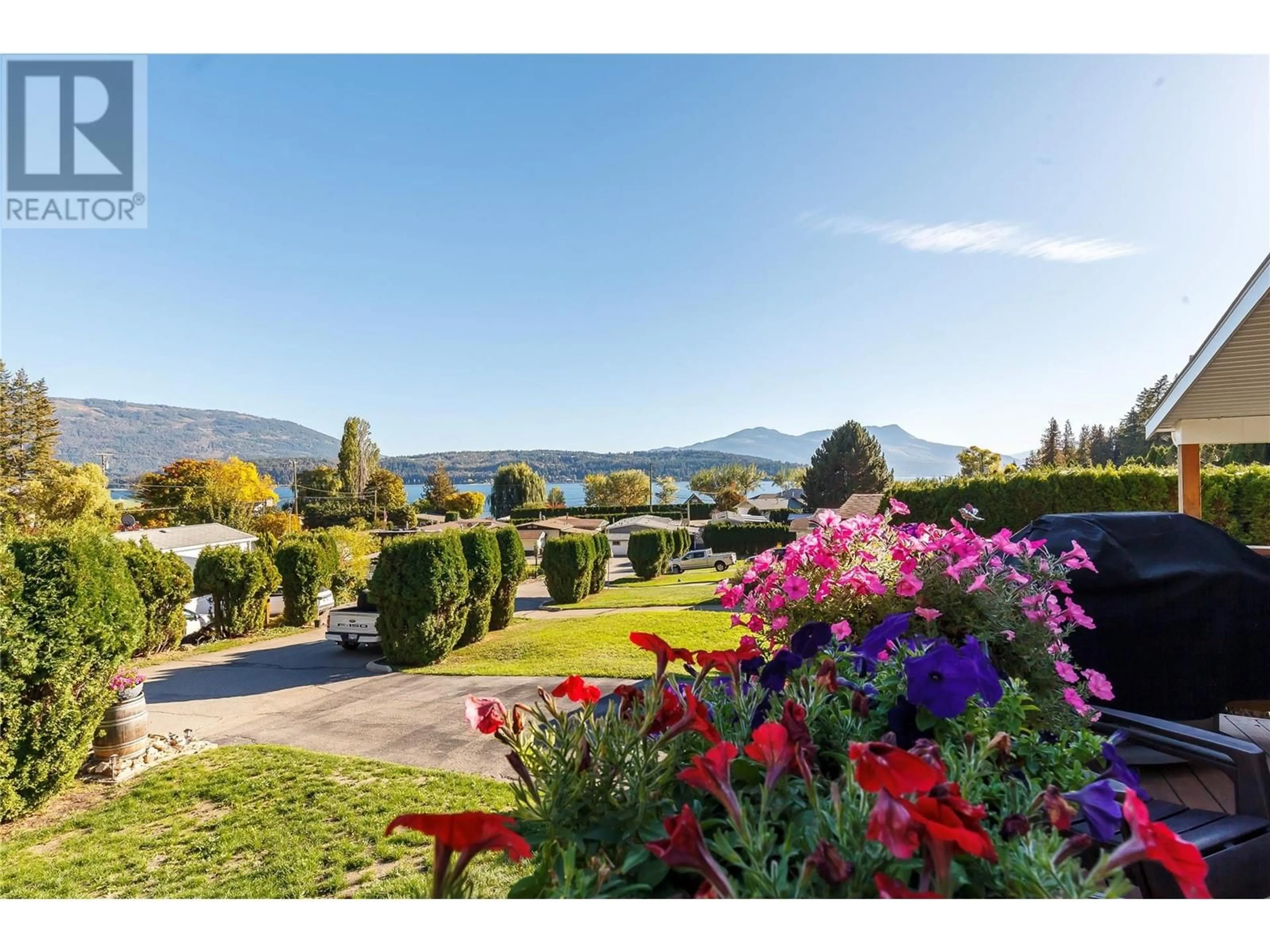 A pic from outside/outdoor area/front of a property/back of a property/a pic from drone, water/lake/river/ocean view for 537 Begbie Road Unit# 7, Tappen British Columbia V0E2X1