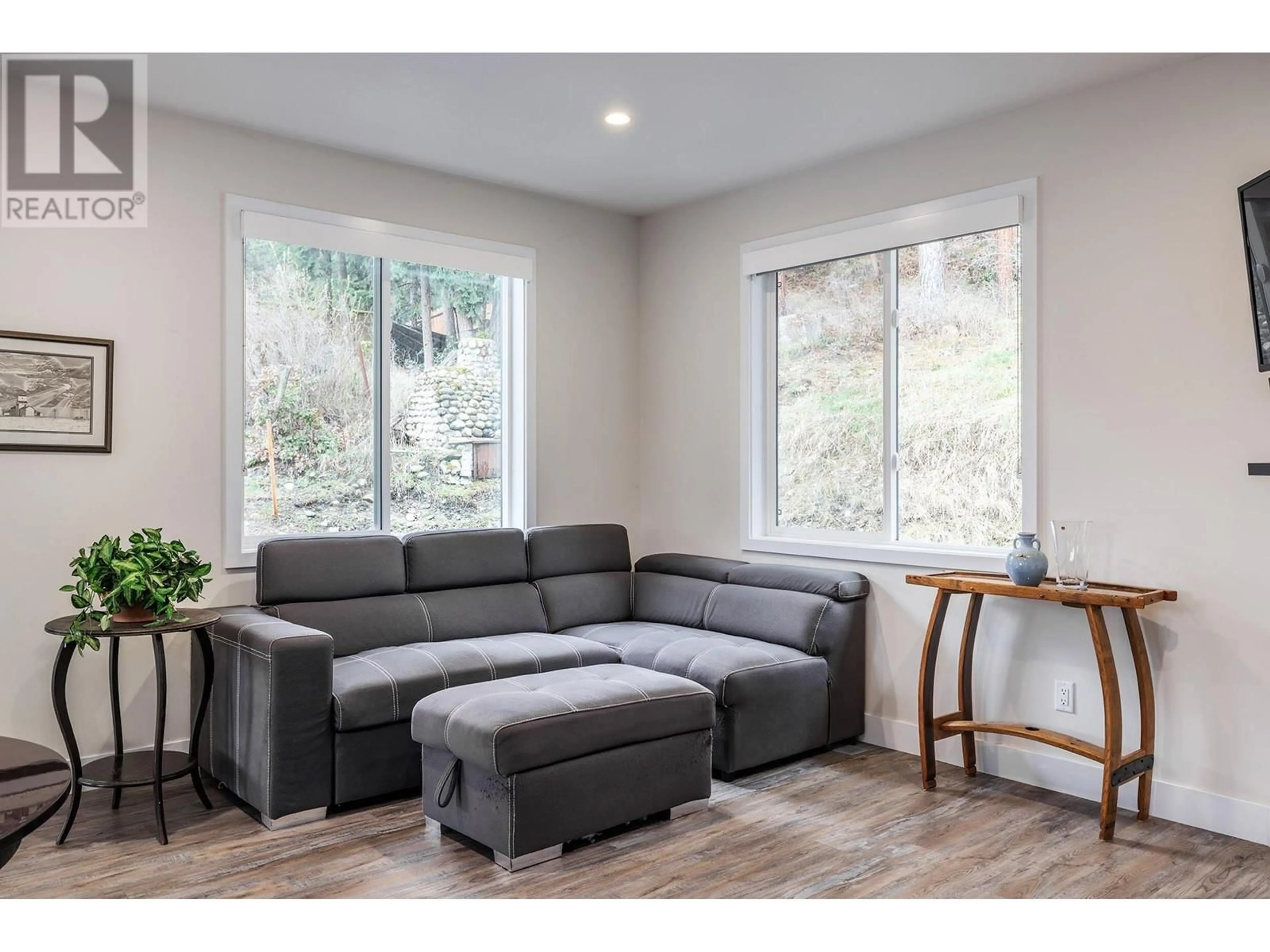 Living room, wood floors for 873 Dehart Road, Kelowna British Columbia V1W4N2