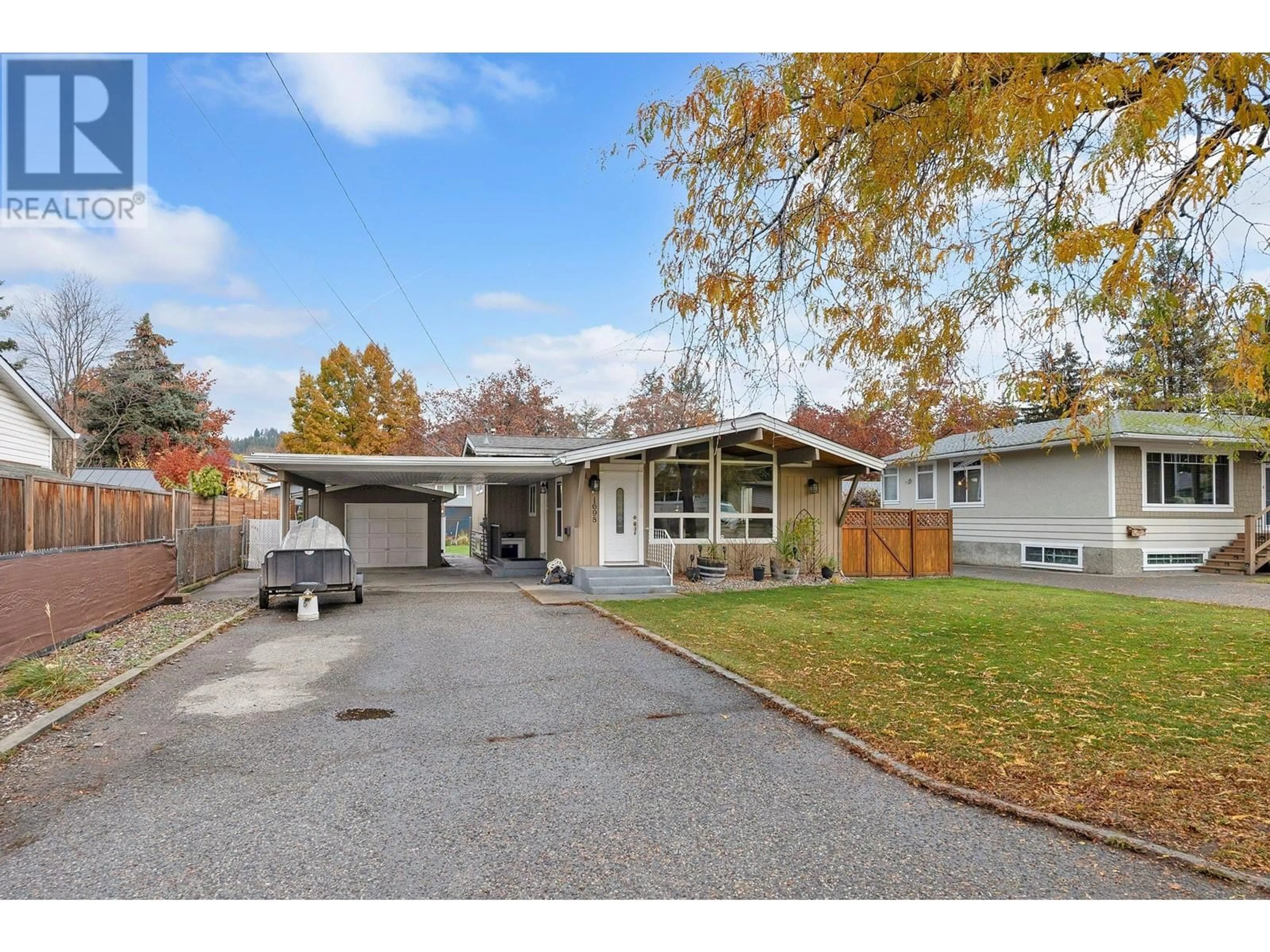 Frontside or backside of a home, the street view for 1698 Gillard Drive, Kelowna British Columbia V1Y4K1