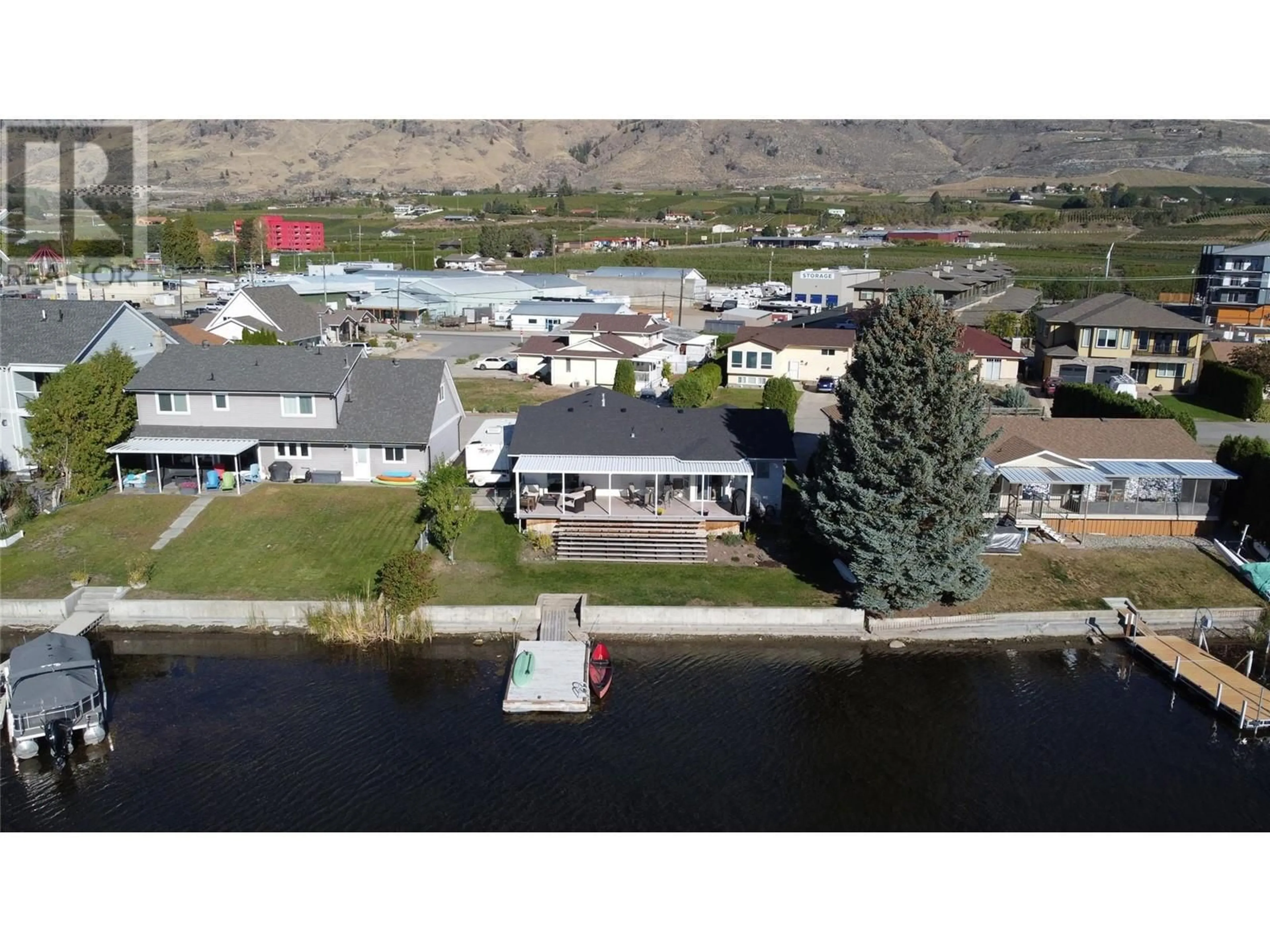 A pic from outside/outdoor area/front of a property/back of a property/a pic from drone, water/lake/river/ocean view for 38 BAYVIEW CRESCENT, Osoyoos British Columbia V0H1V0