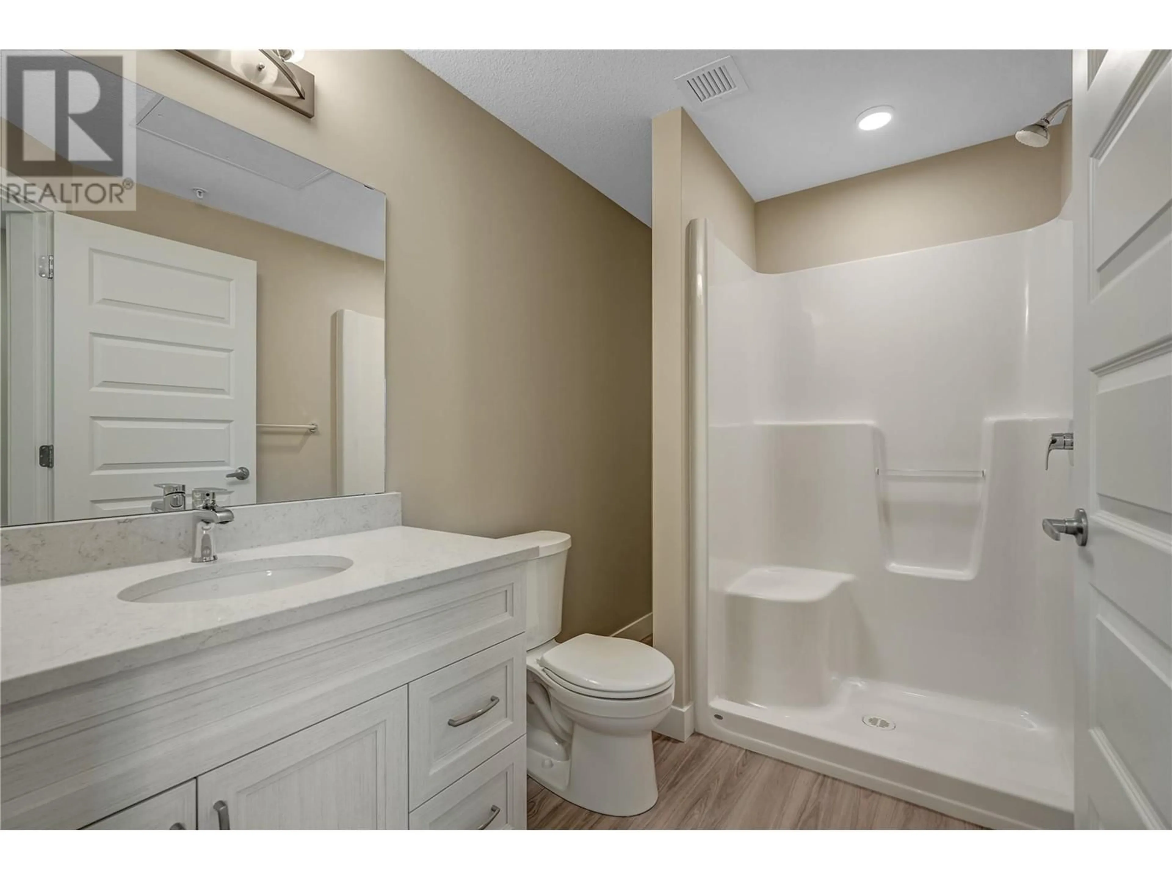 Standard bathroom, wood floors for 5640 51st Street Unit# 408, Osoyoos British Columbia V0H1V6