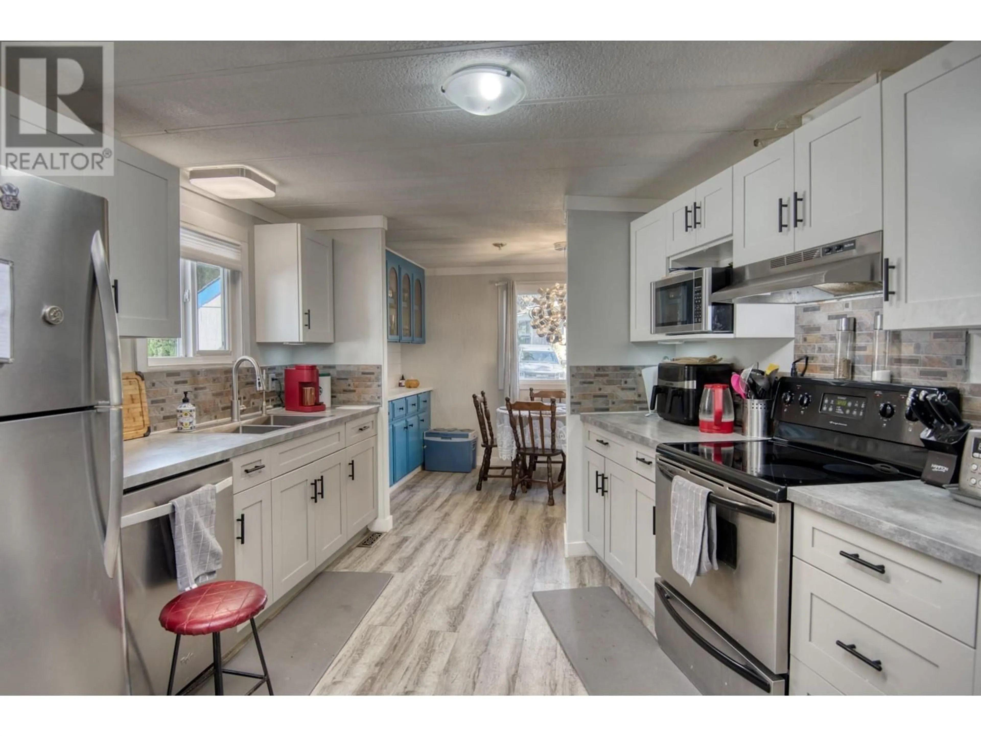 Open concept kitchen for 1929 Hwy 97S Unit# 16, West Kelowna British Columbia V1Z2Z1