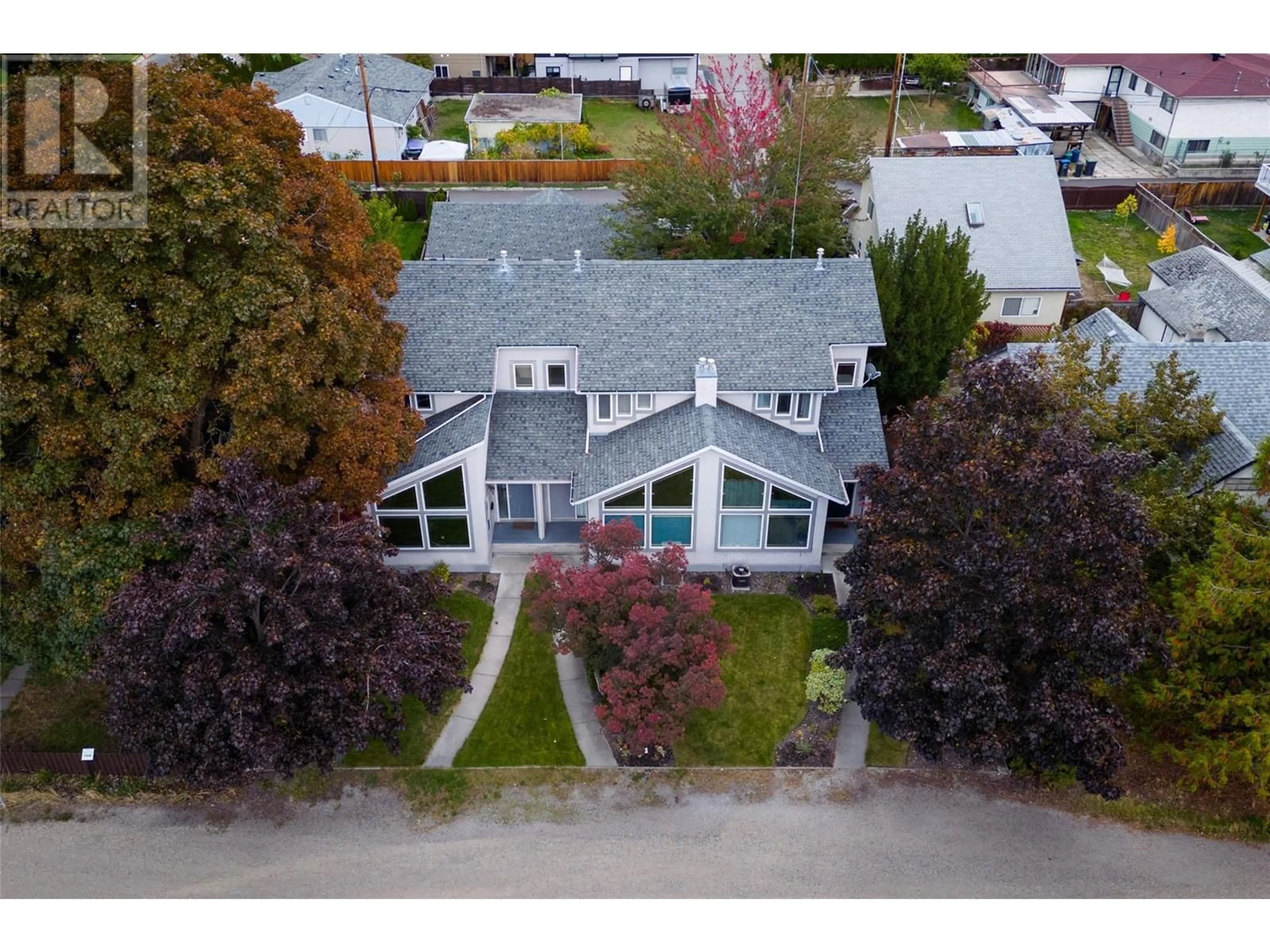 Frontside or backside of a home, cottage for 2419 Richter Street, Kelowna British Columbia V1Y2P5