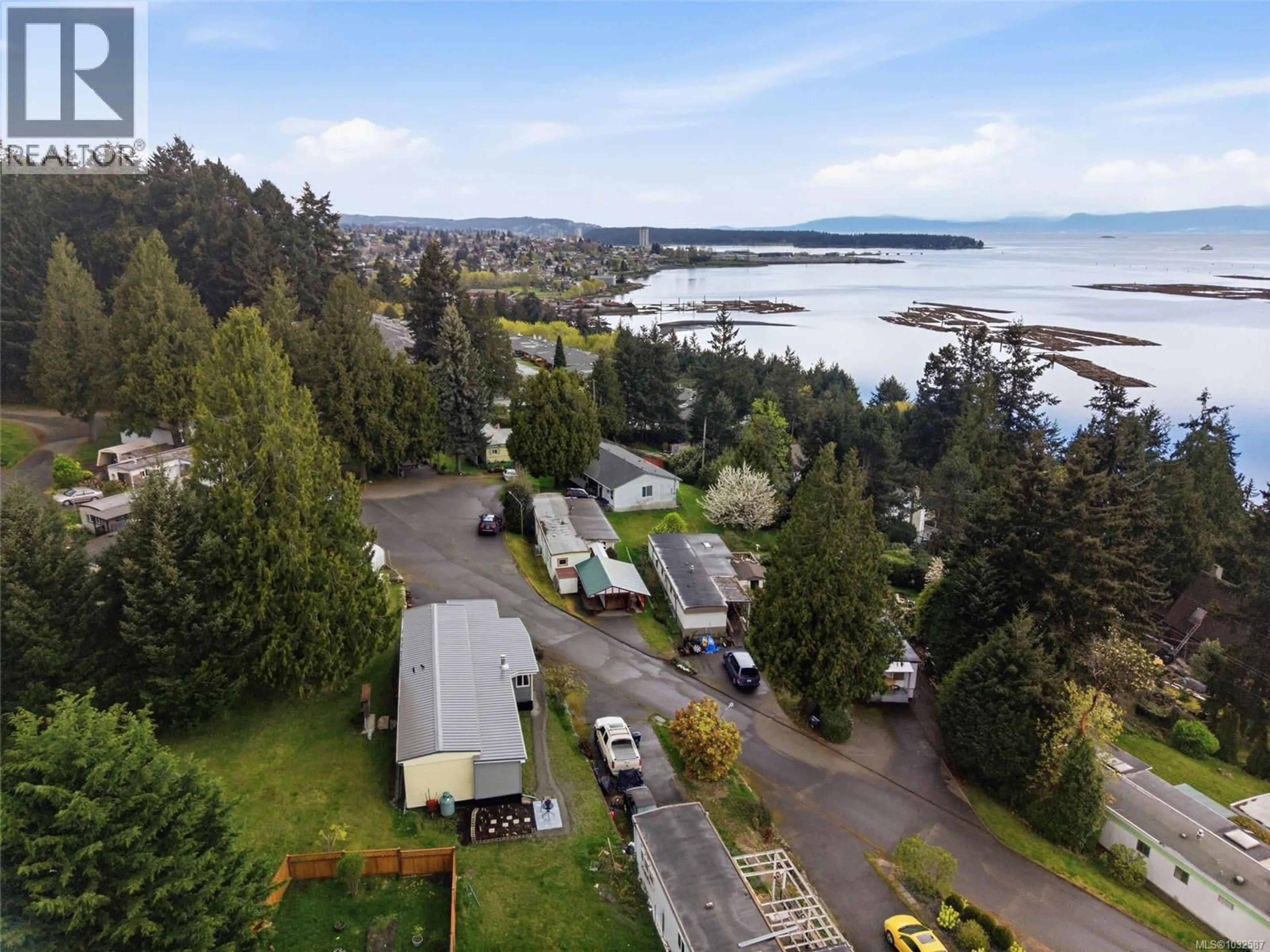A pic from outside/outdoor area/front of a property/back of a property/a pic from drone, water/lake/river/ocean view for 16 - 1000 CHASE RIVER ROAD, Nanaimo British Columbia V9R6L8
