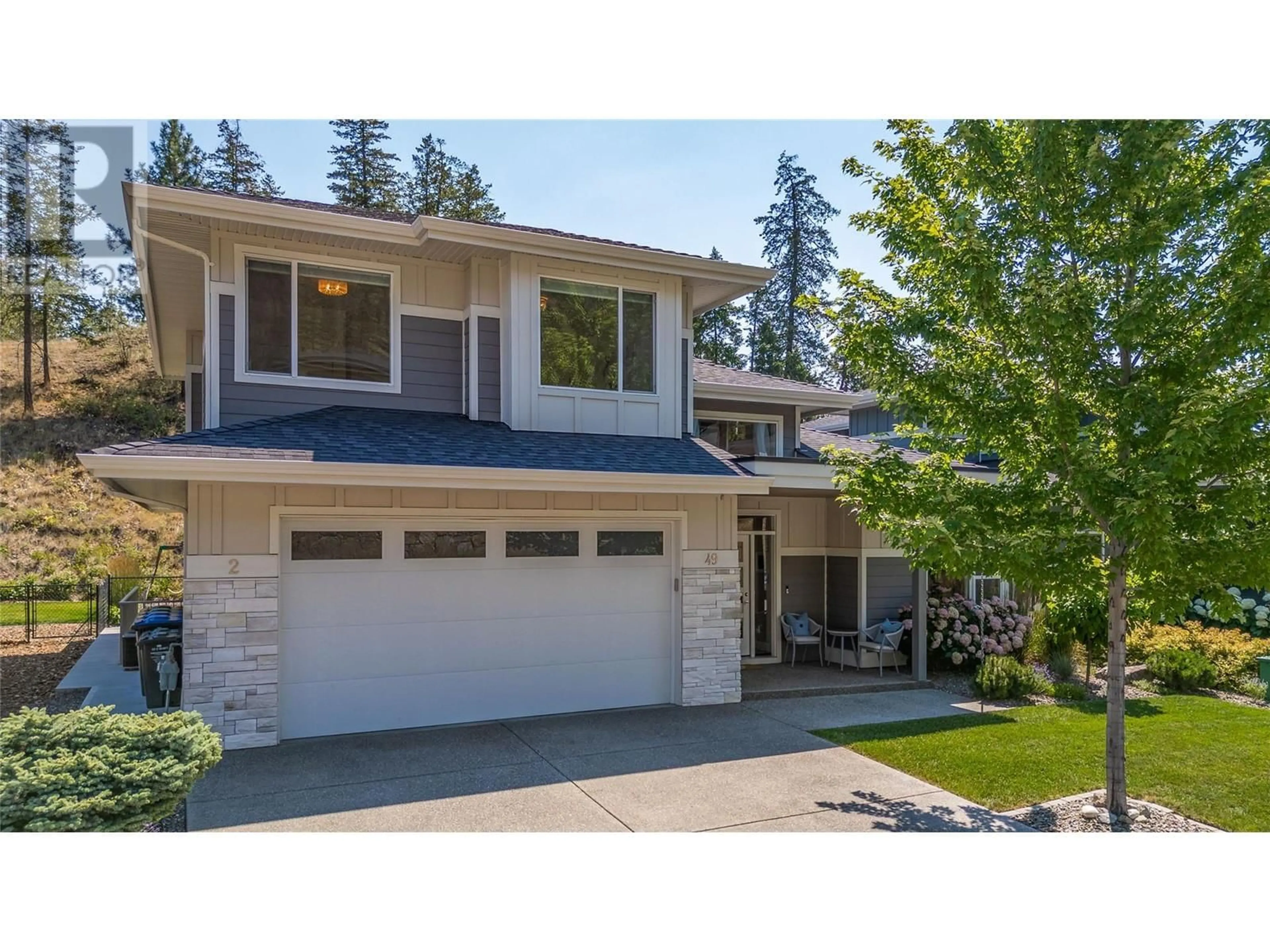 Frontside or backside of a home, cottage for 49 Forest Edge Drive, Kelowna British Columbia V1V3G3