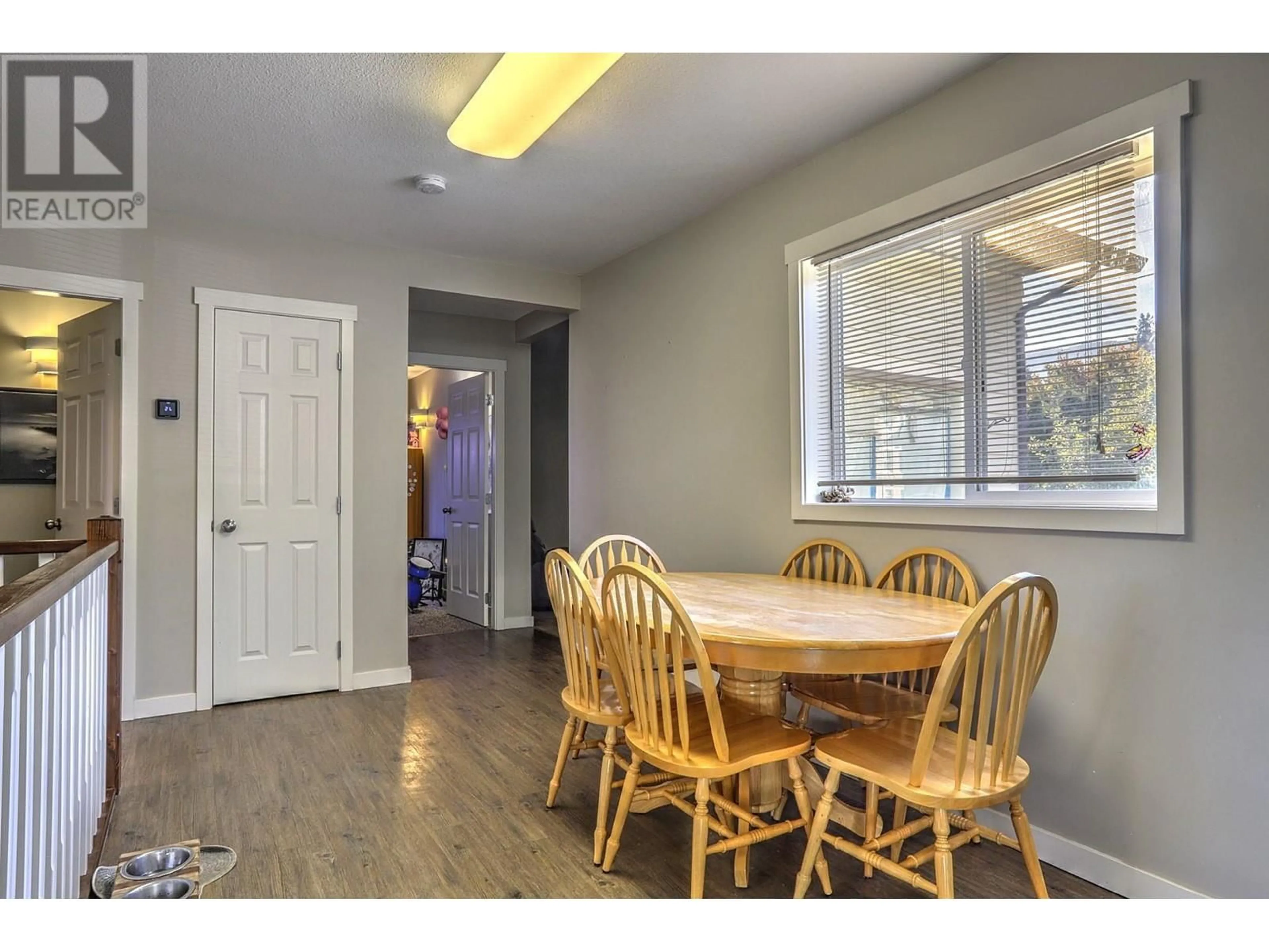 Dining room, wood floors, cottage for 3035 Pleasant Valley Road, Armstrong British Columbia V4Y0J3