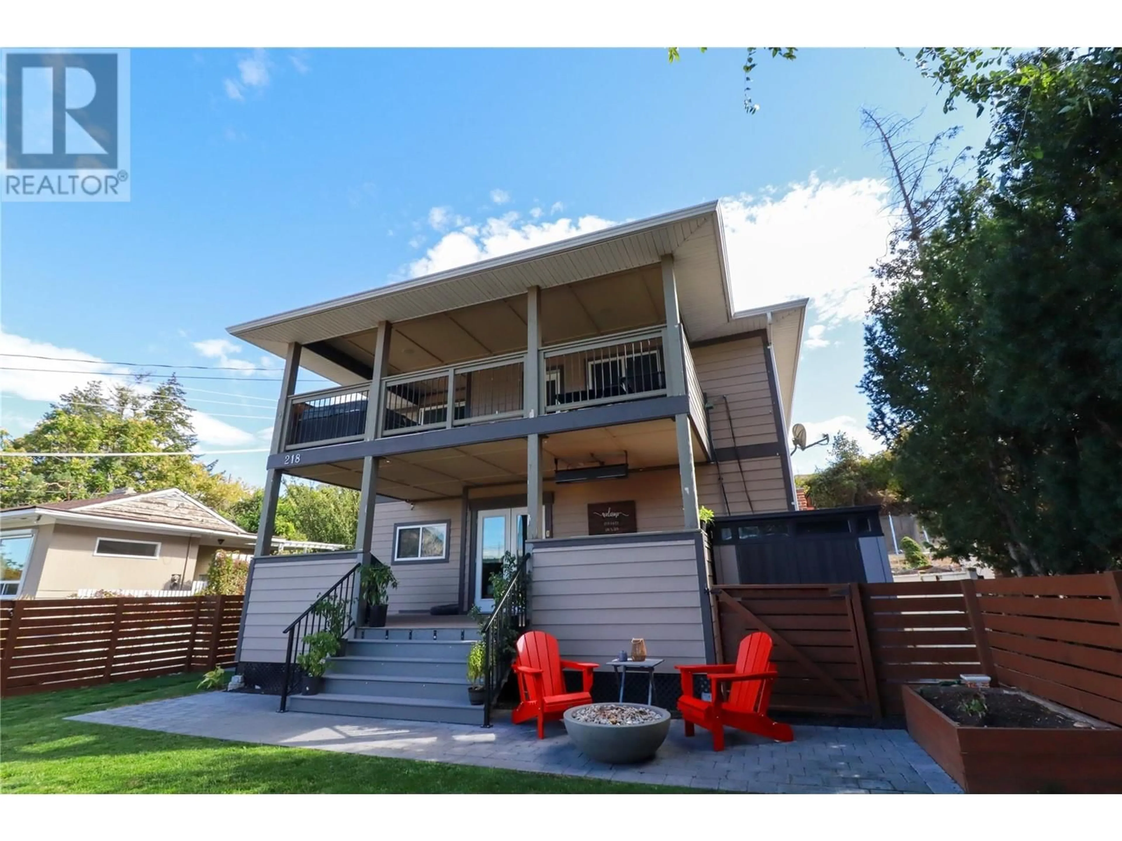 Frontside or backside of a home, the fenced backyard for 218 NORTON Street, Penticton British Columbia V2A4H7