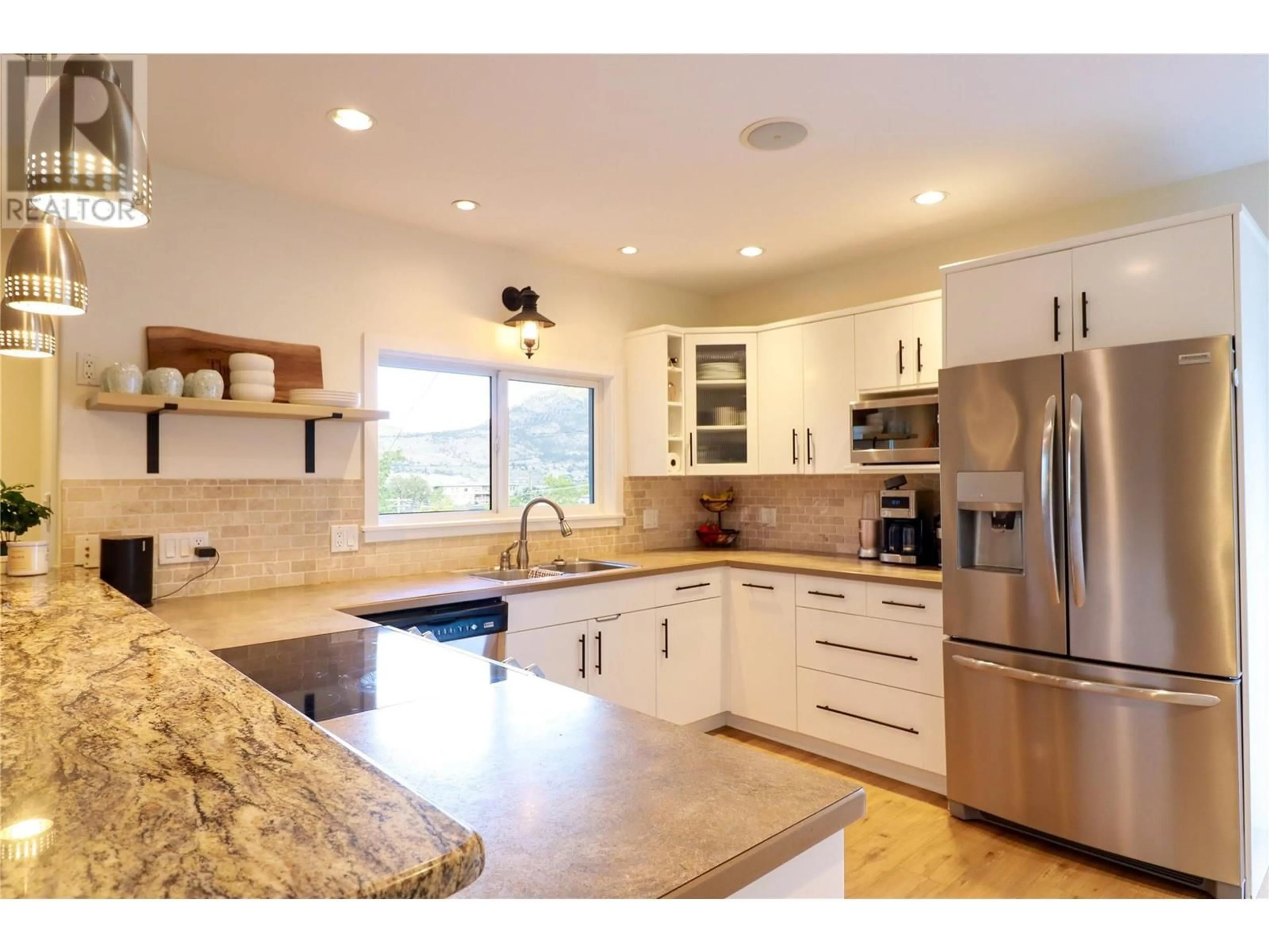 Open concept kitchen for 218 NORTON Street, Penticton British Columbia V2A4H7