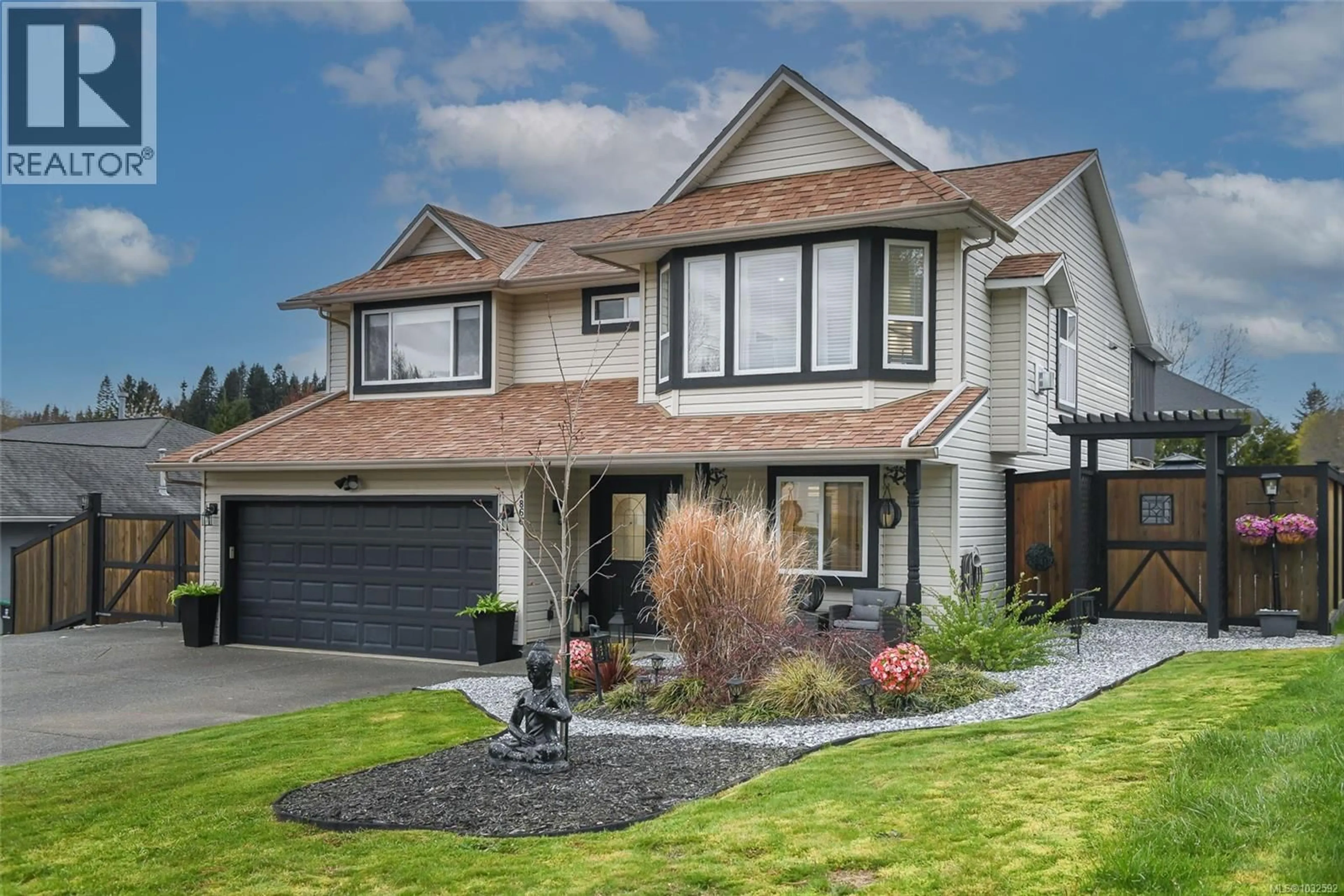 Home with vinyl exterior material, street for 1866 HAWK DRIVE, Courtenay British Columbia V9N8Y8