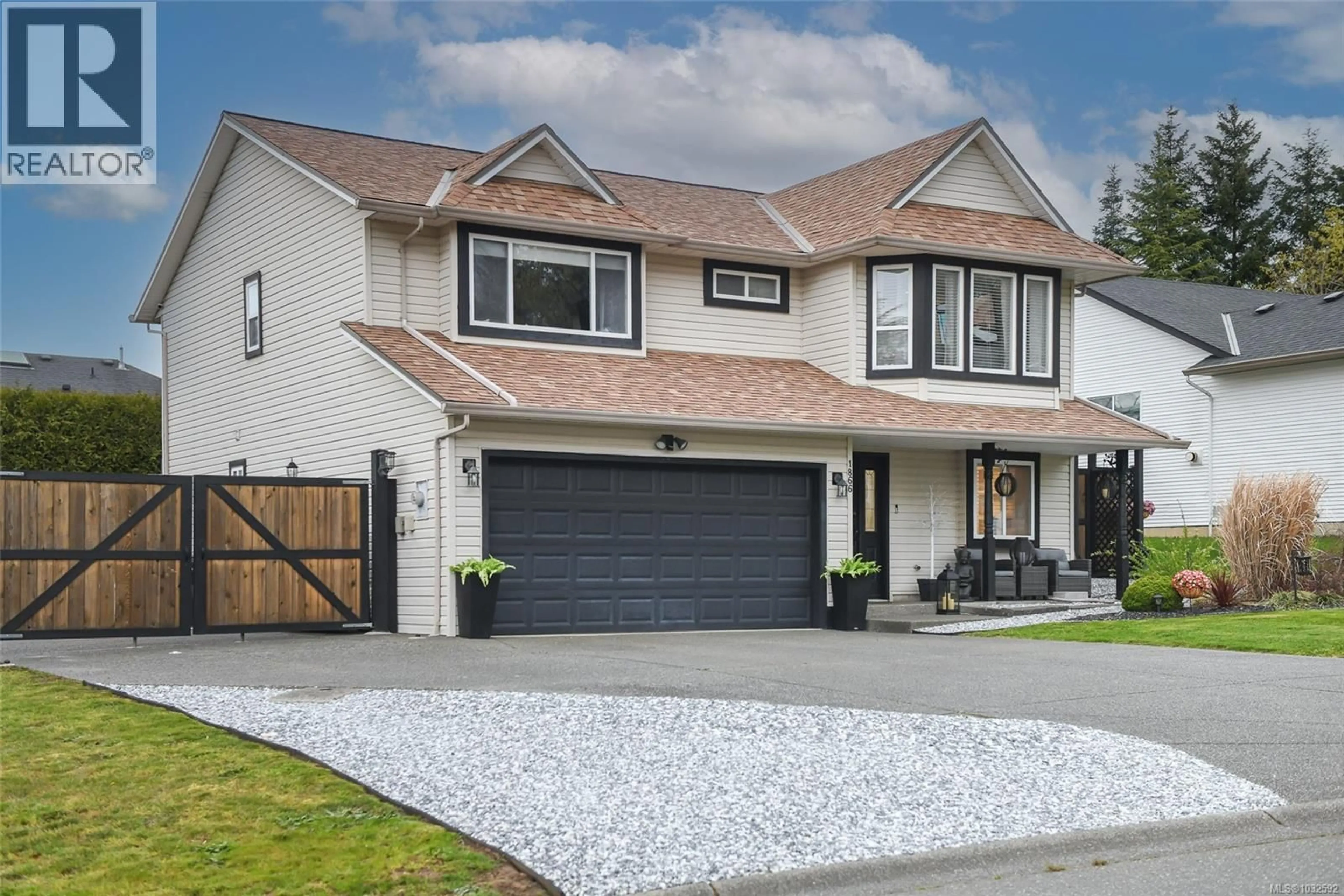 Home with vinyl exterior material, street for 1866 HAWK DRIVE, Courtenay British Columbia V9N8Y8