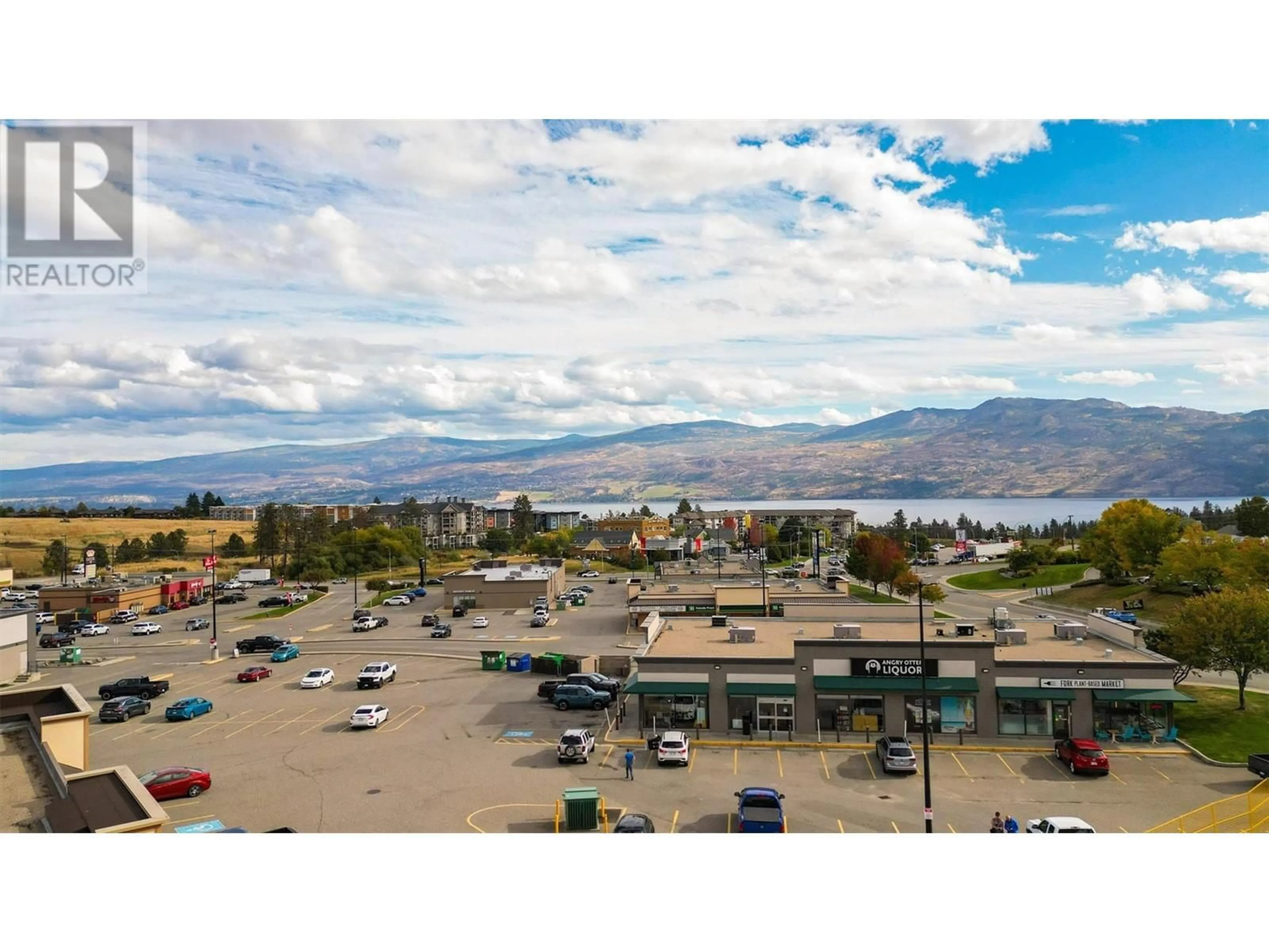 A pic from outside/outdoor area/front of a property/back of a property/a pic from drone, mountain view for 401 - 3645 GOSSET ROAD, West Kelowna British Columbia V1Z4C9