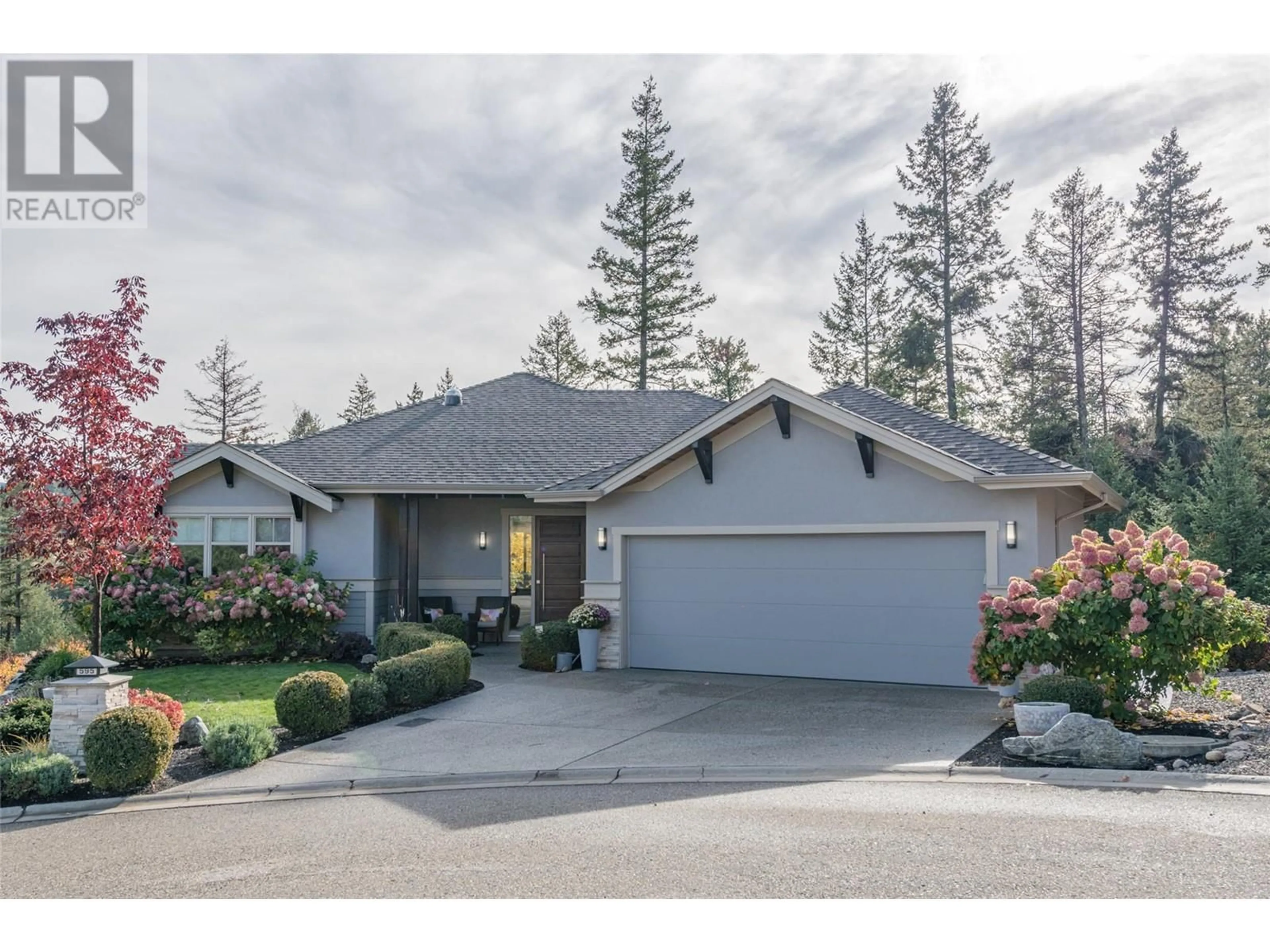 Frontside or backside of a home, cottage for 595 Longspoon Court, Vernon British Columbia V1H2K2