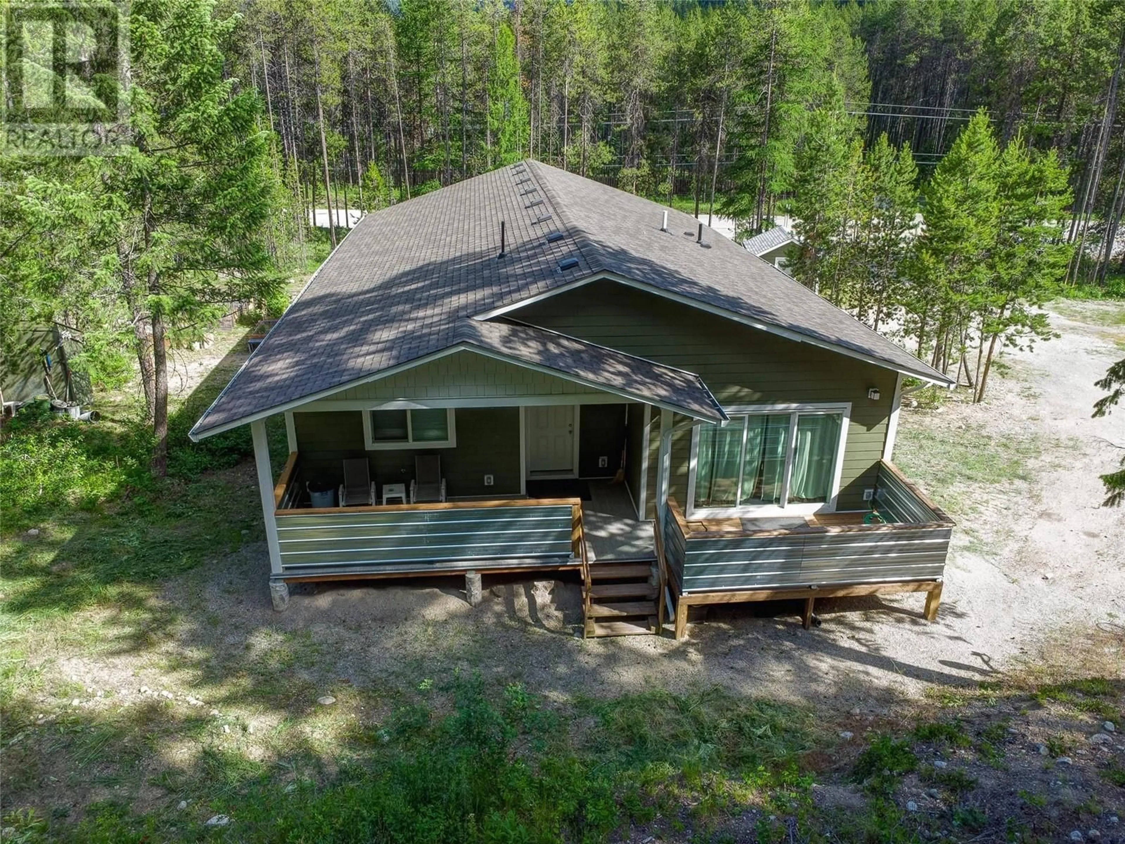 A pic from outside/outdoor area/front of a property/back of a property/a pic from drone, unknown for 4820 Highway 33, Beaverdell British Columbia V0H1A0