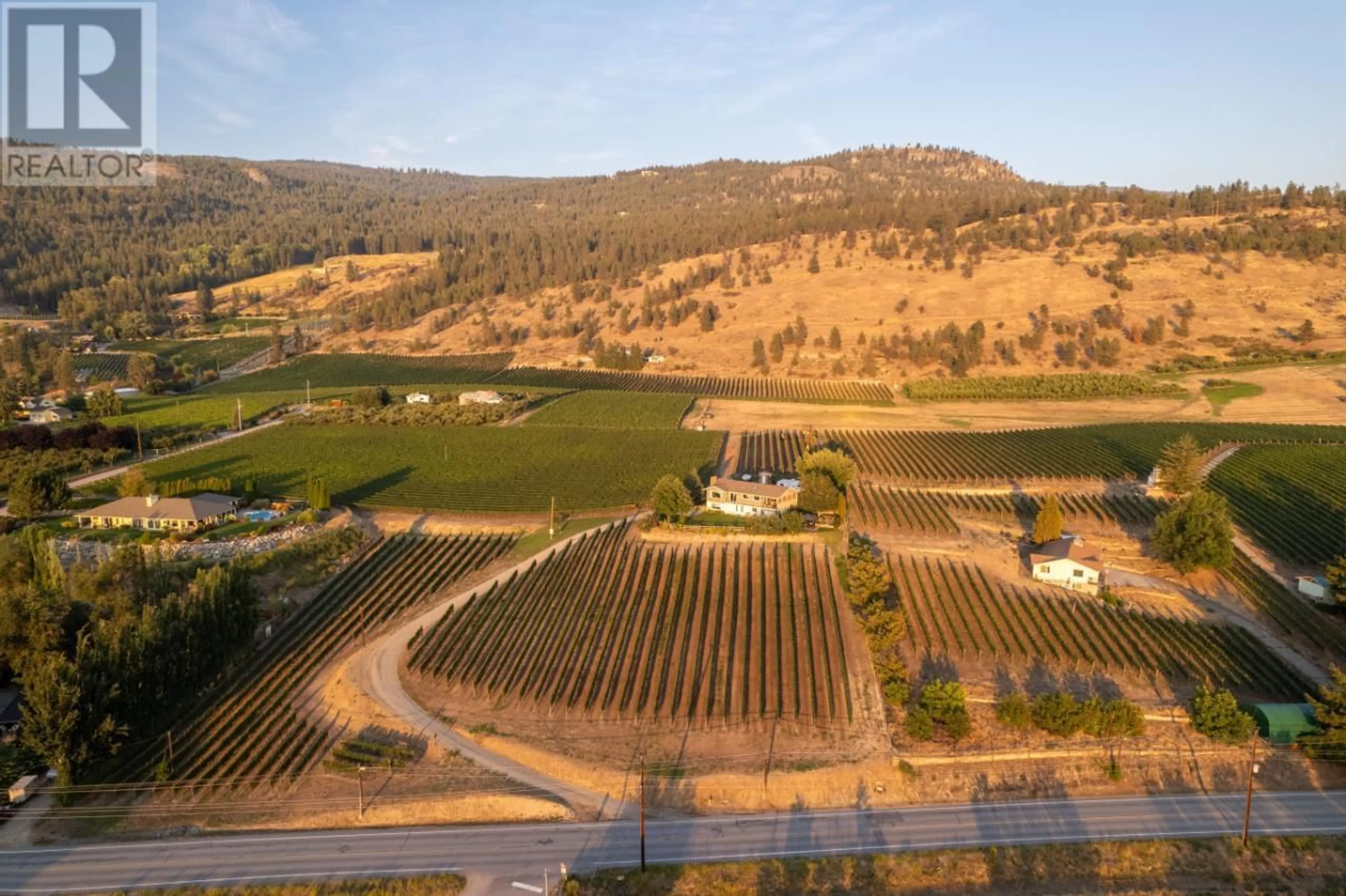 A pic from outside/outdoor area/front of a property/back of a property/a pic from drone, mountain view for 1116 NARAMATA ROAD, Penticton British Columbia V2A8T6