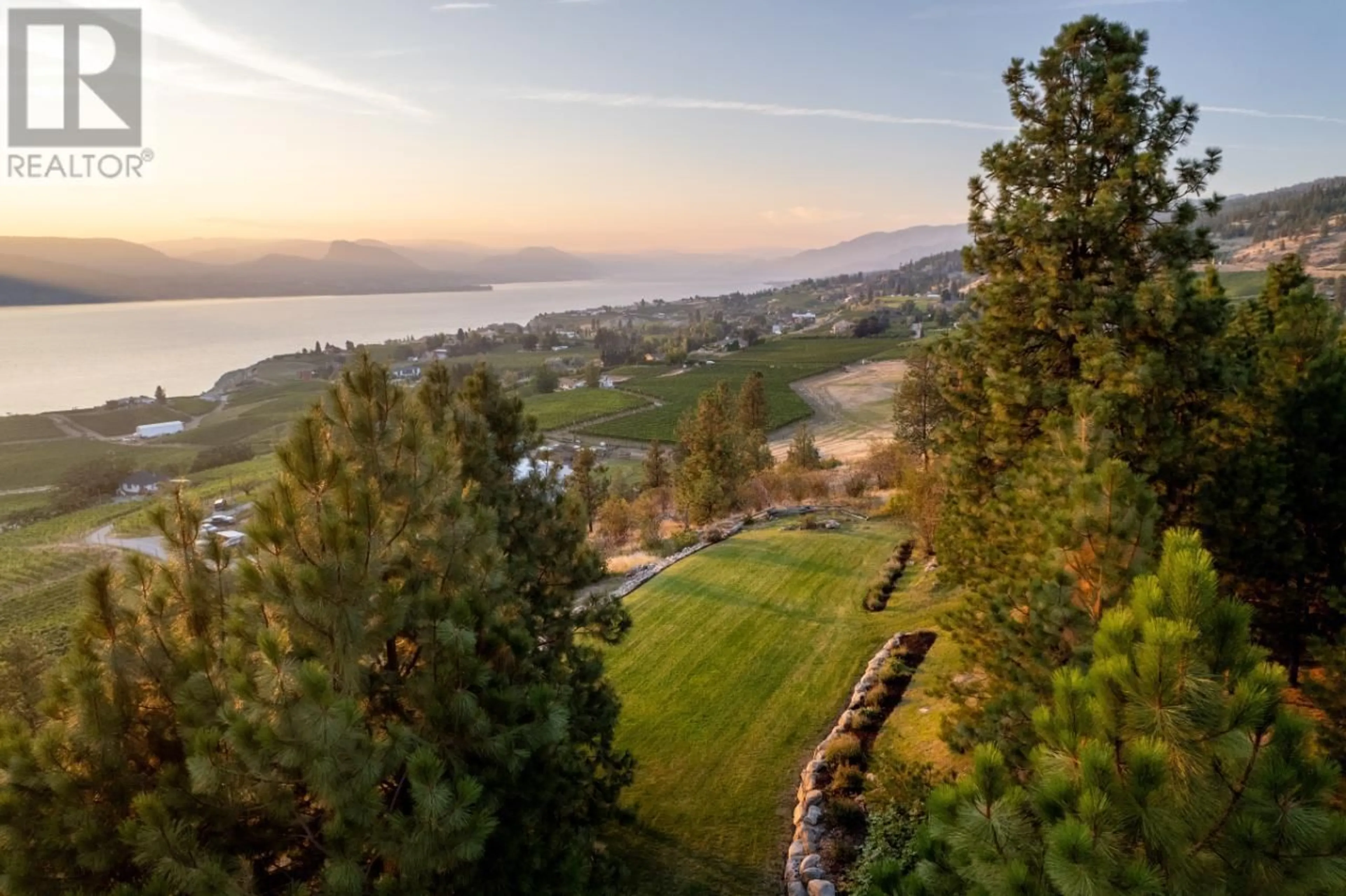 A pic from outside/outdoor area/front of a property/back of a property/a pic from drone, water/lake/river/ocean view for 1116 NARAMATA ROAD, Penticton British Columbia V2A8T6