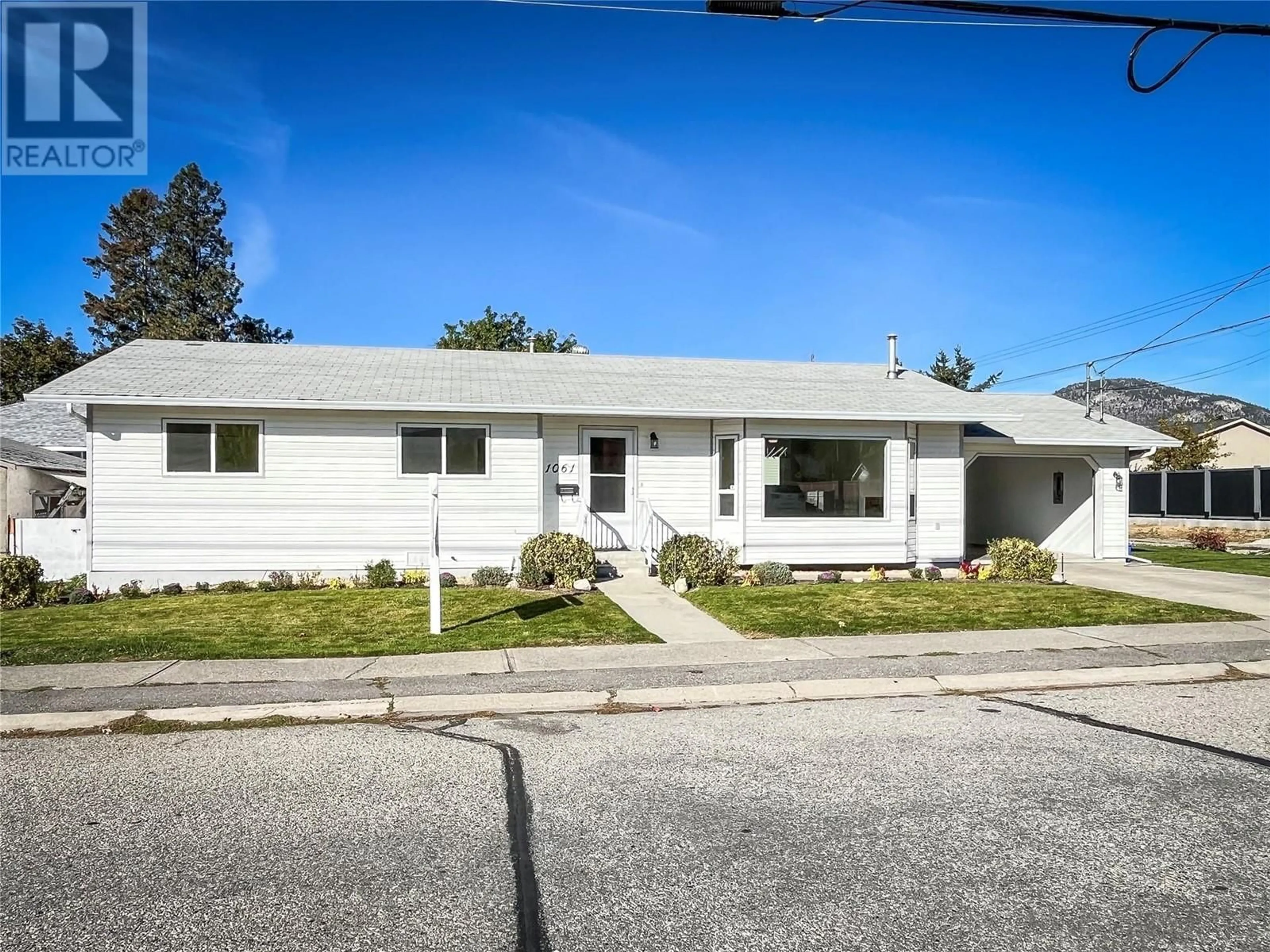 Frontside or backside of a home, the street view for 1061 Argyle Street, Penticton British Columbia V2A5P3