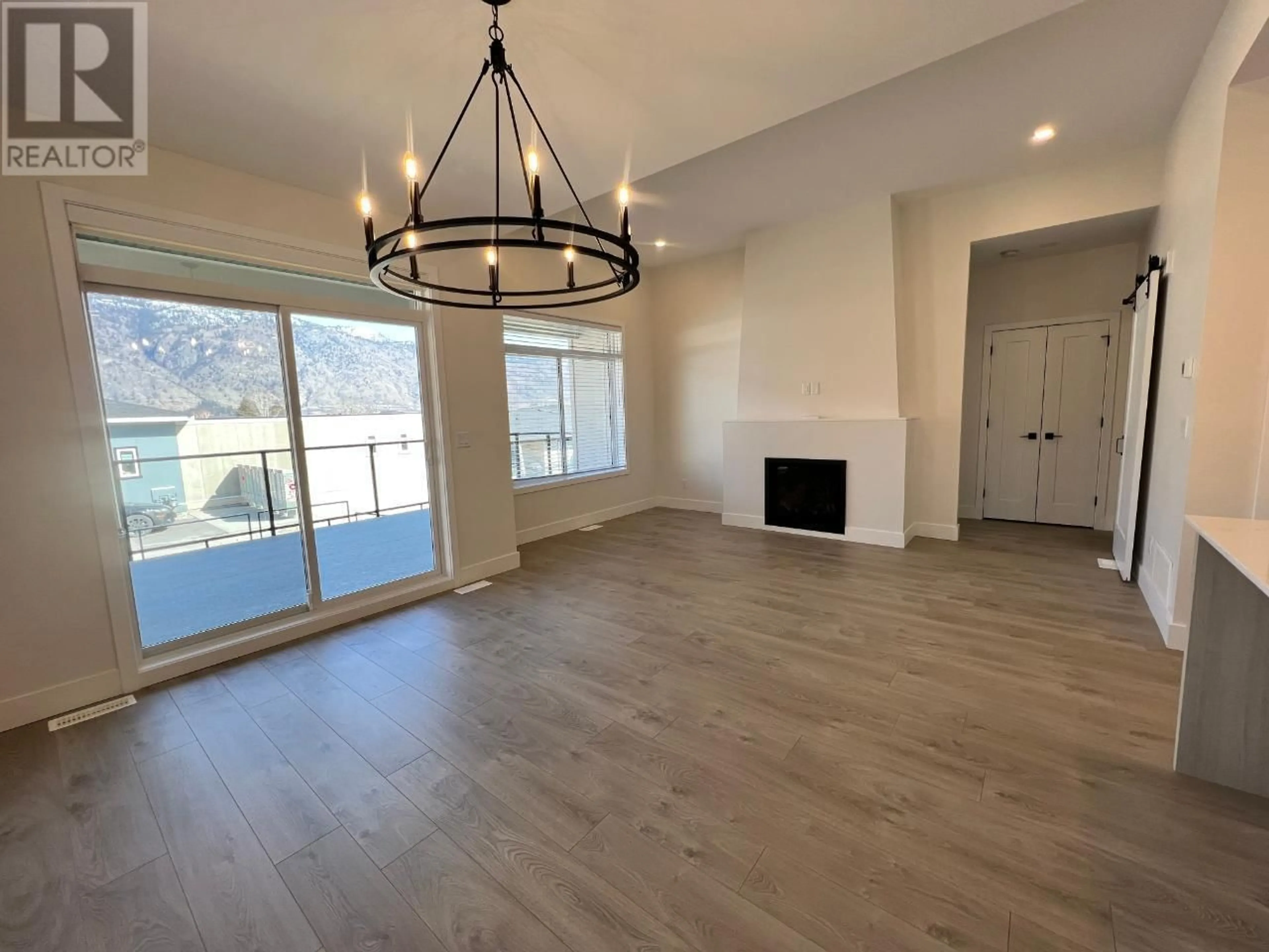 A pic of a room, wood floors for 8000 VEDETTE Drive Unit# 23, Osoyoos British Columbia V0H1V2