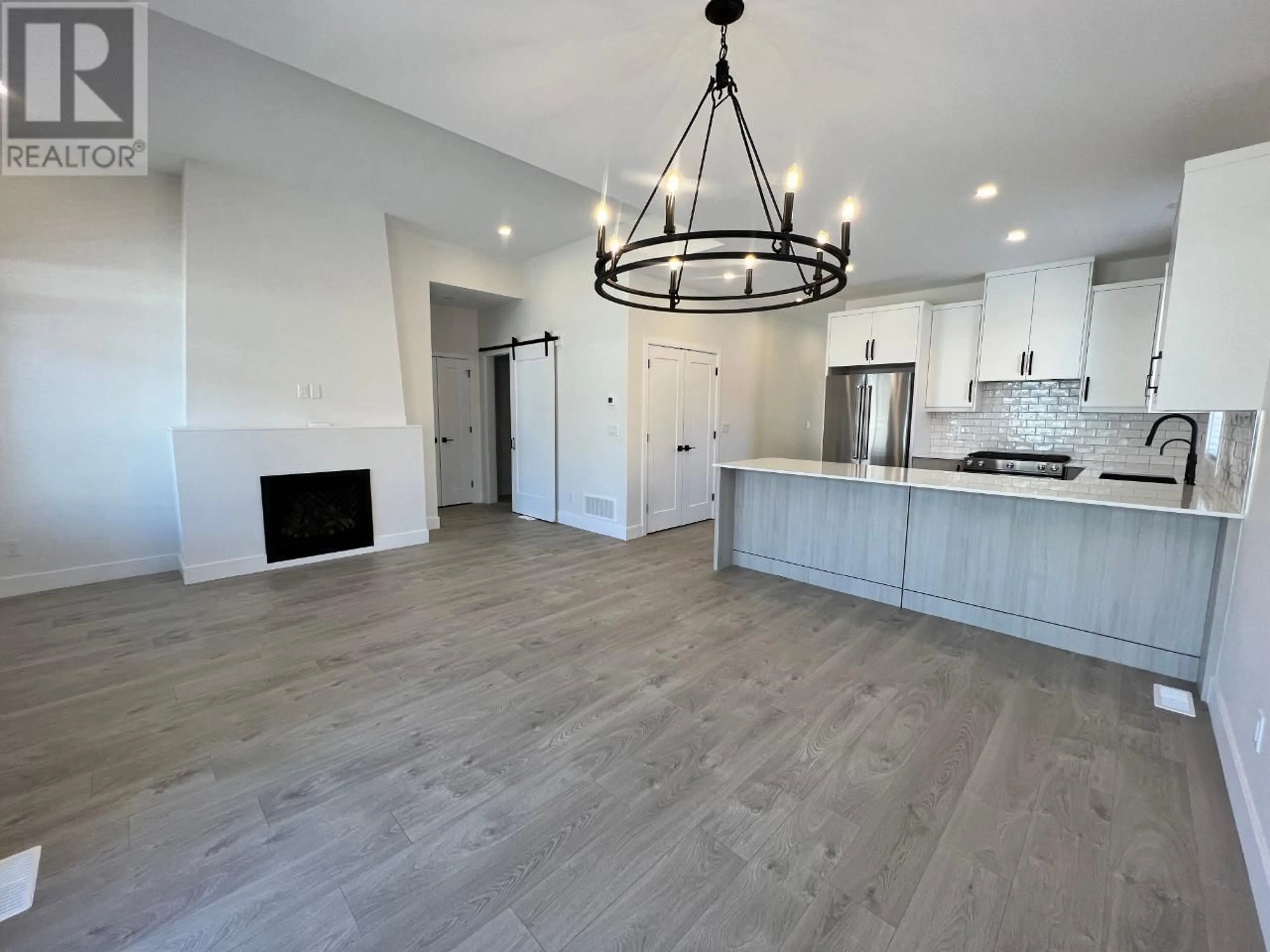 Open concept kitchen for 8000 VEDETTE Drive Unit# 23, Osoyoos British Columbia V0H1V2