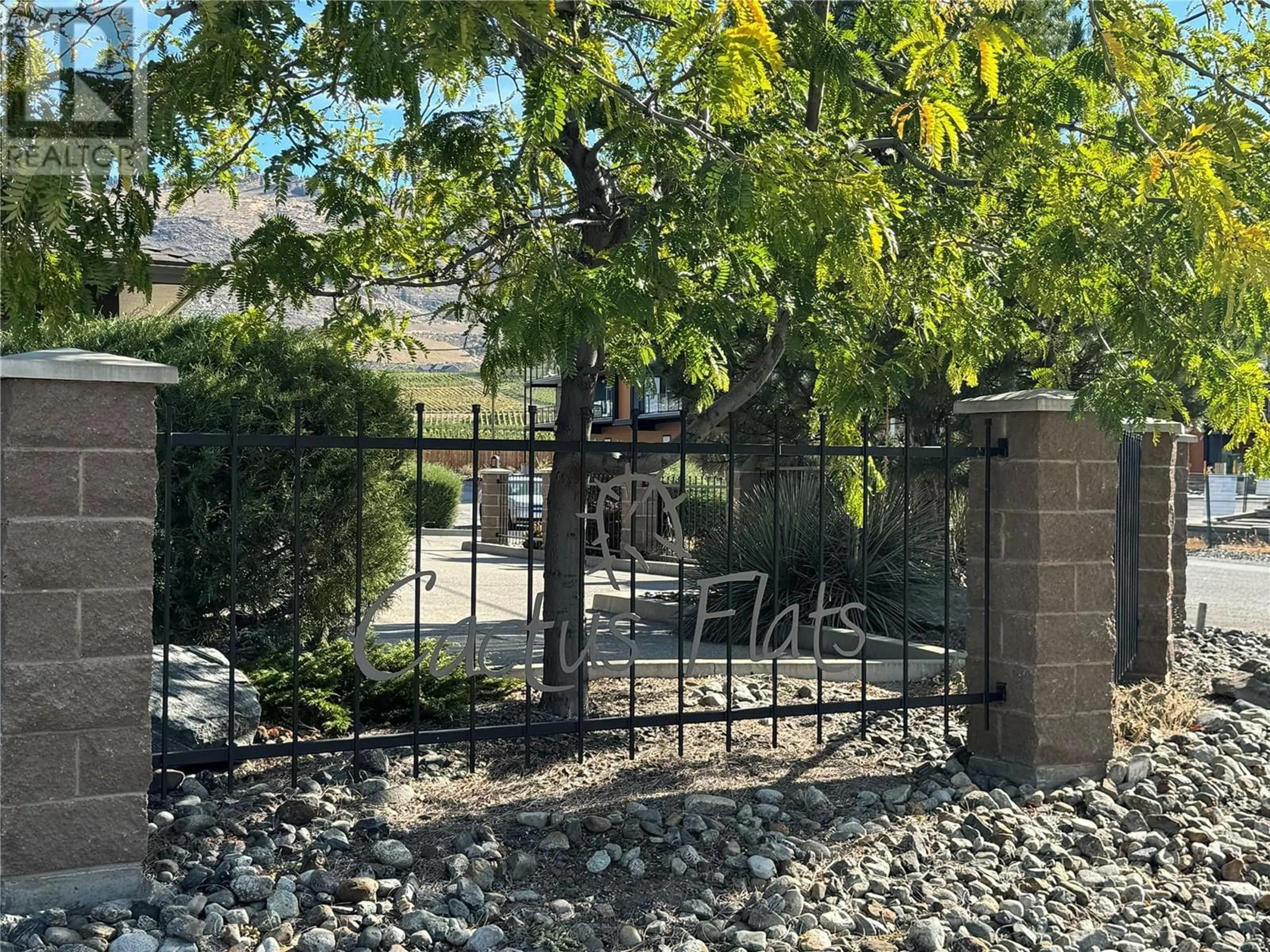 Patio, the fenced backyard for 5803 Lakeshore Drive Unit# 13, Osoyoos British Columbia V0H1V6