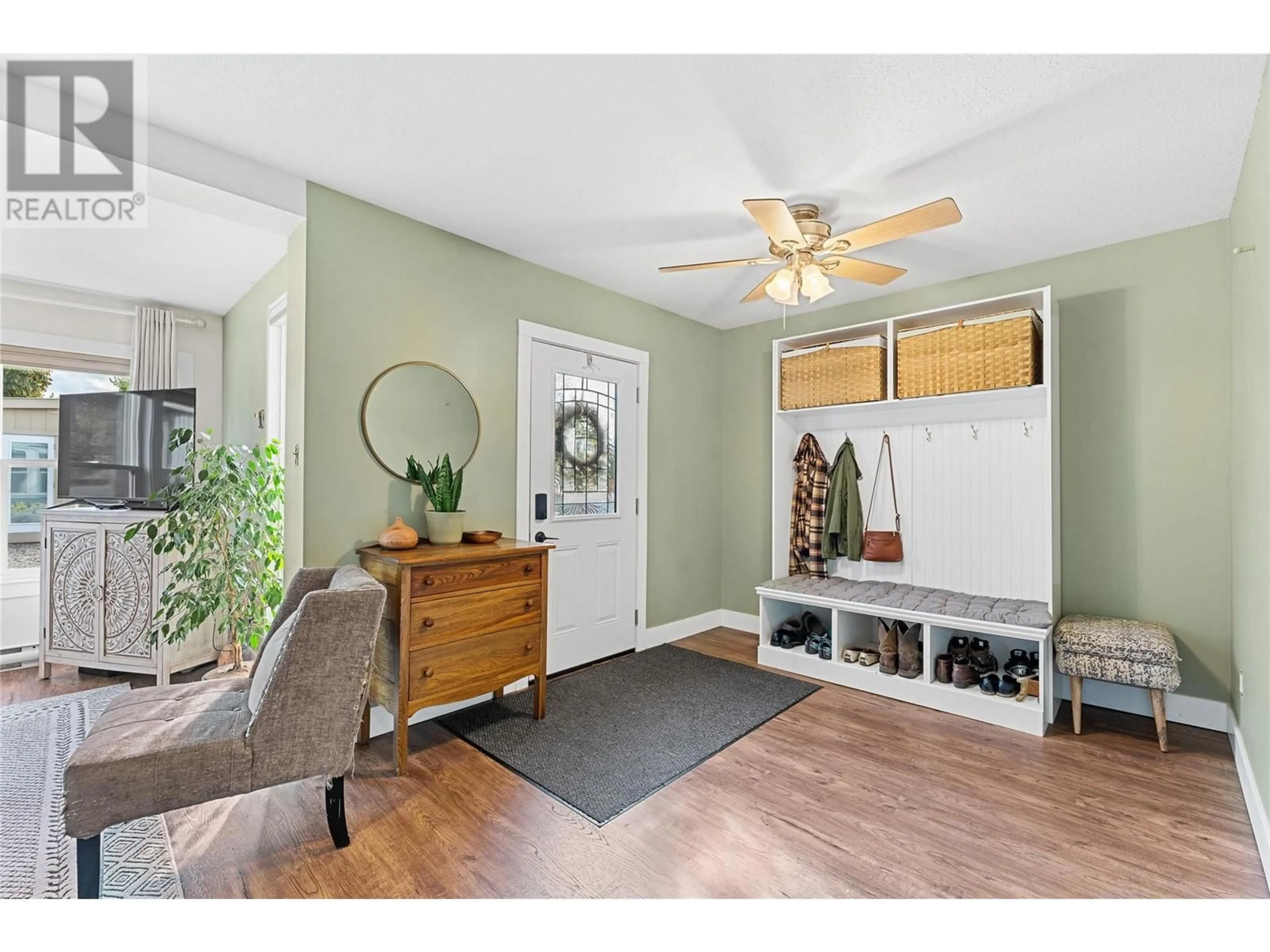 Indoor entryway, wood floors for 2990 McCulloch Road, Kelowna British Columbia V1W4A5