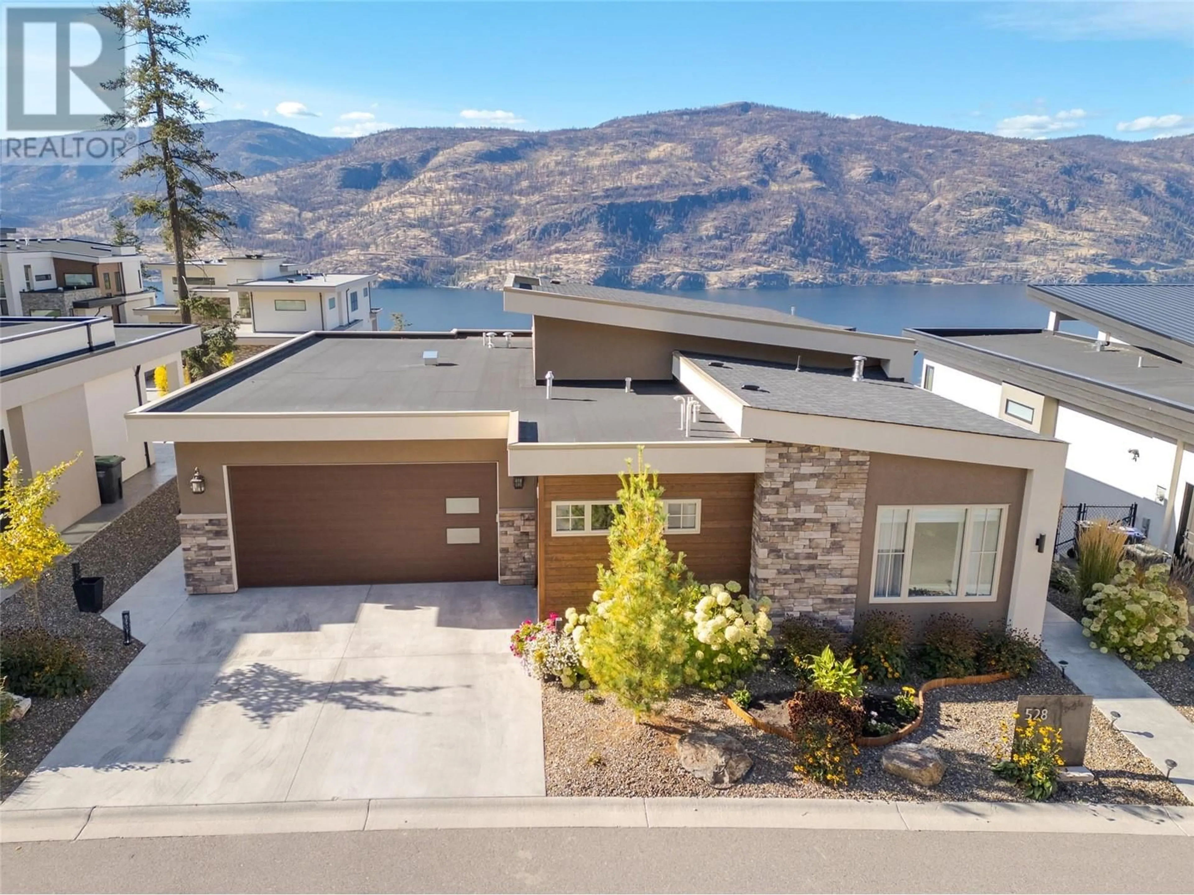 Frontside or backside of a home, mountain for 528 Clifton Lane, Kelowna British Columbia V1V0B7