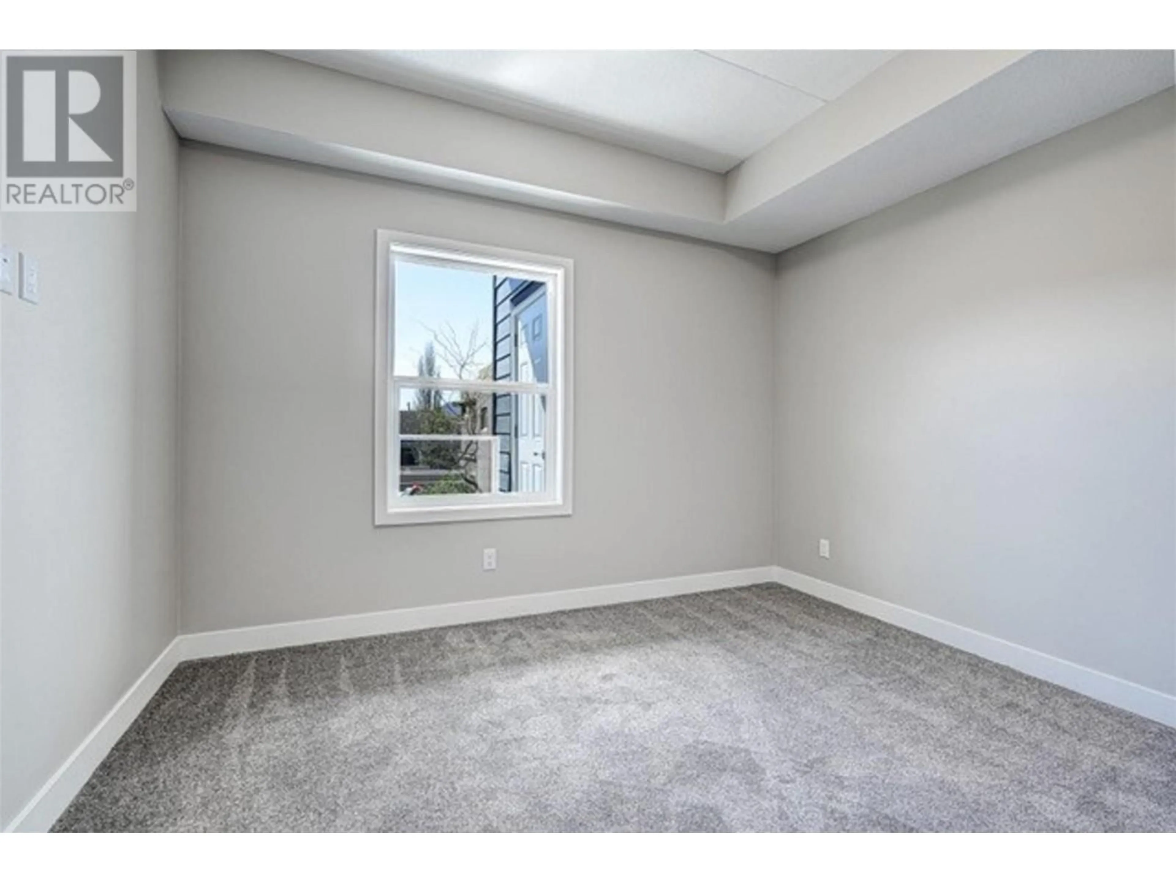 A pic of a room, carpet floors for 306 5620 - 51st Street, Osoyoos British Columbia V0H1V6