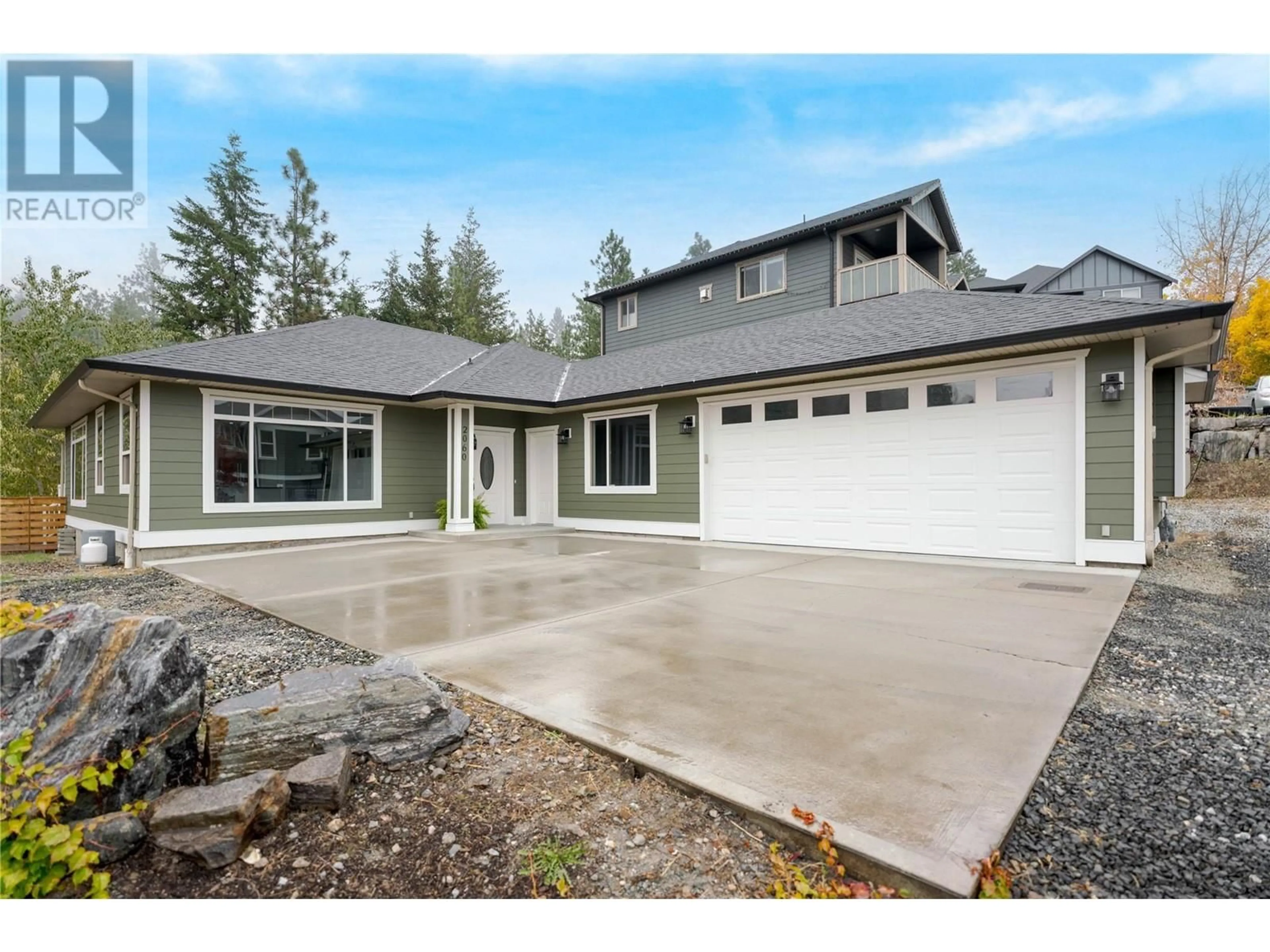 Frontside or backside of a home, cottage for 2060 Sunview Drive, West Kelowna British Columbia V1Z3X6