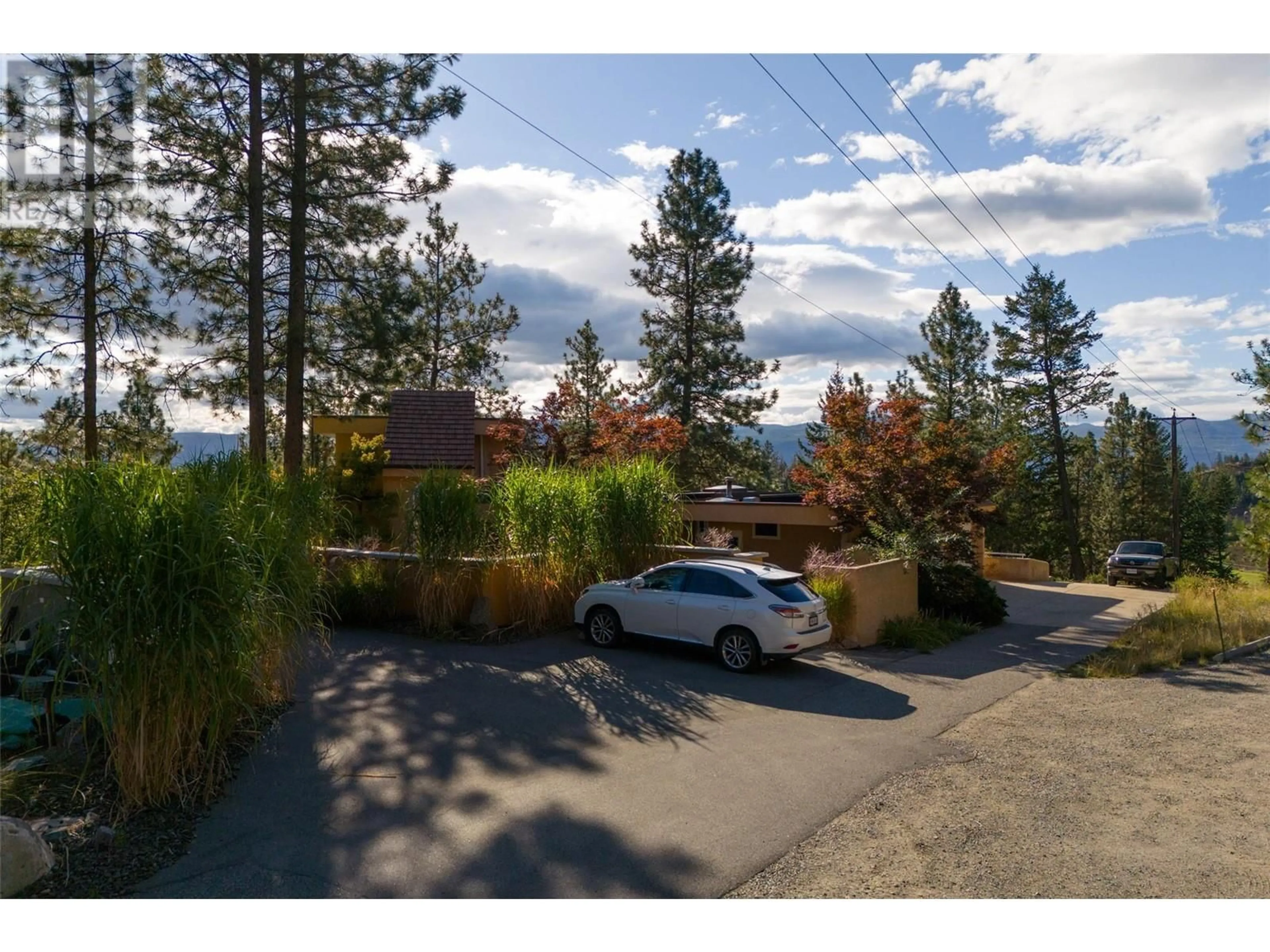 A pic from exterior of the house or condo, the street view for 1642 West Kelowna Road, West Kelowna British Columbia V1Z3B7