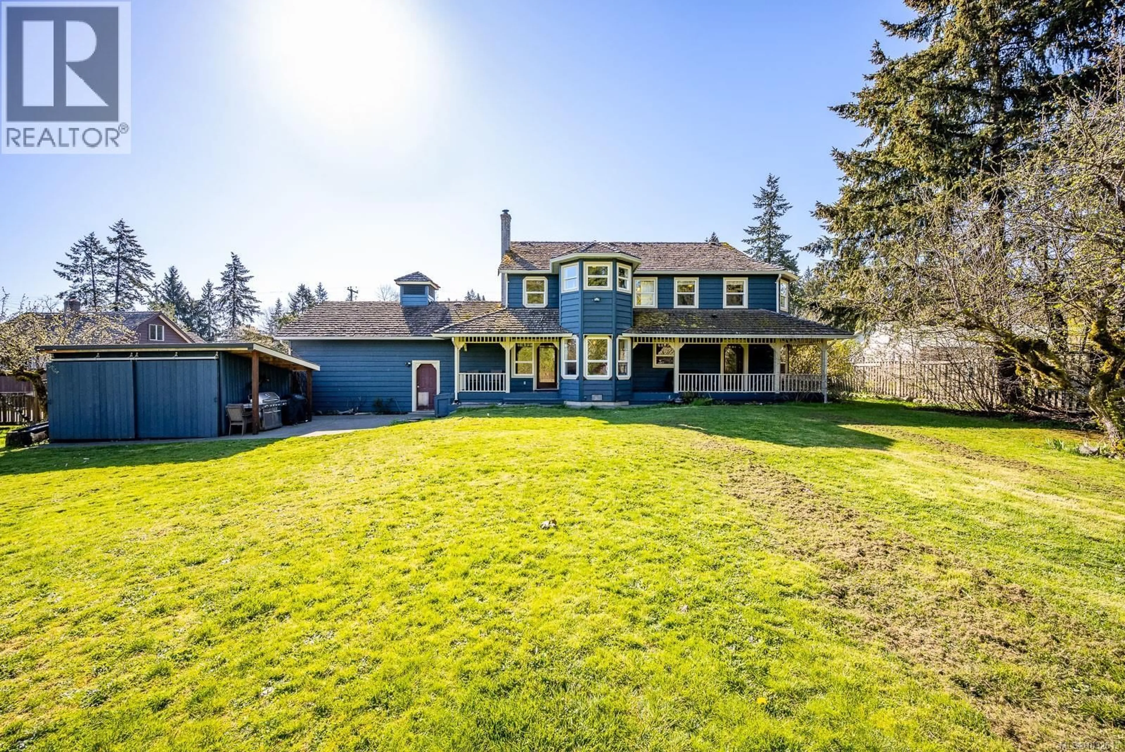 A pic from outside/outdoor area/front of a property/back of a property/a pic from drone, street for 3397 LAKE TRAIL ROAD, Courtenay British Columbia V9N9M2
