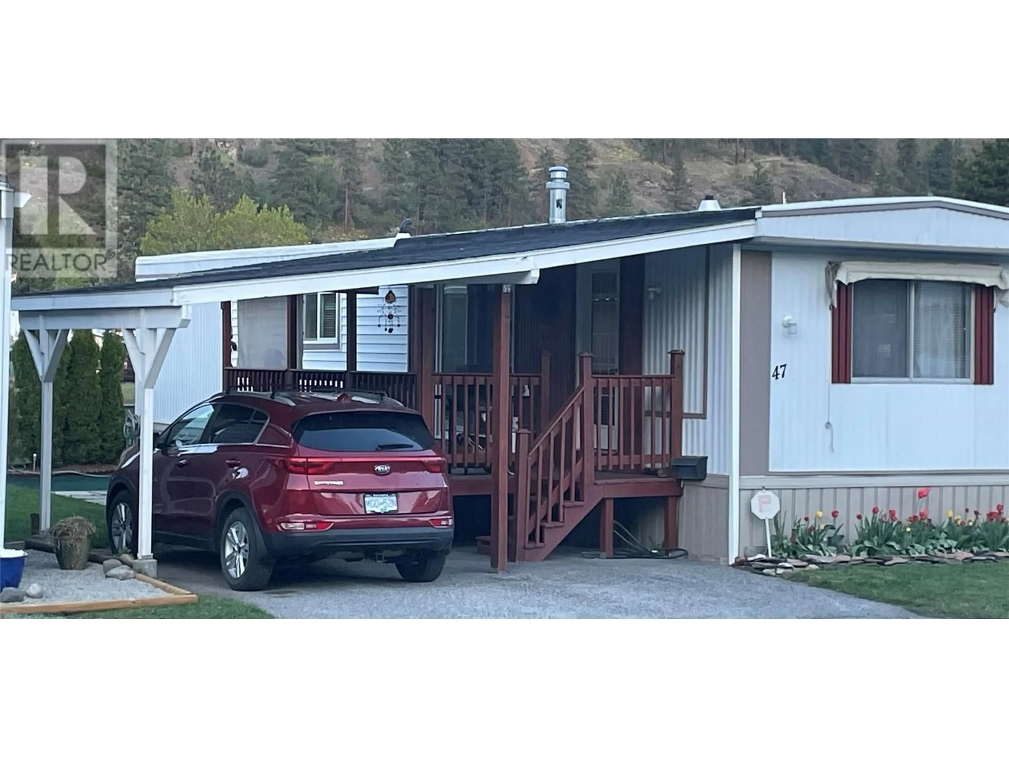 A pic from exterior of the house or condo, cottage for 1929 Highway 97 S Street Unit# 47, West Kelowna British Columbia V1Z2Z1