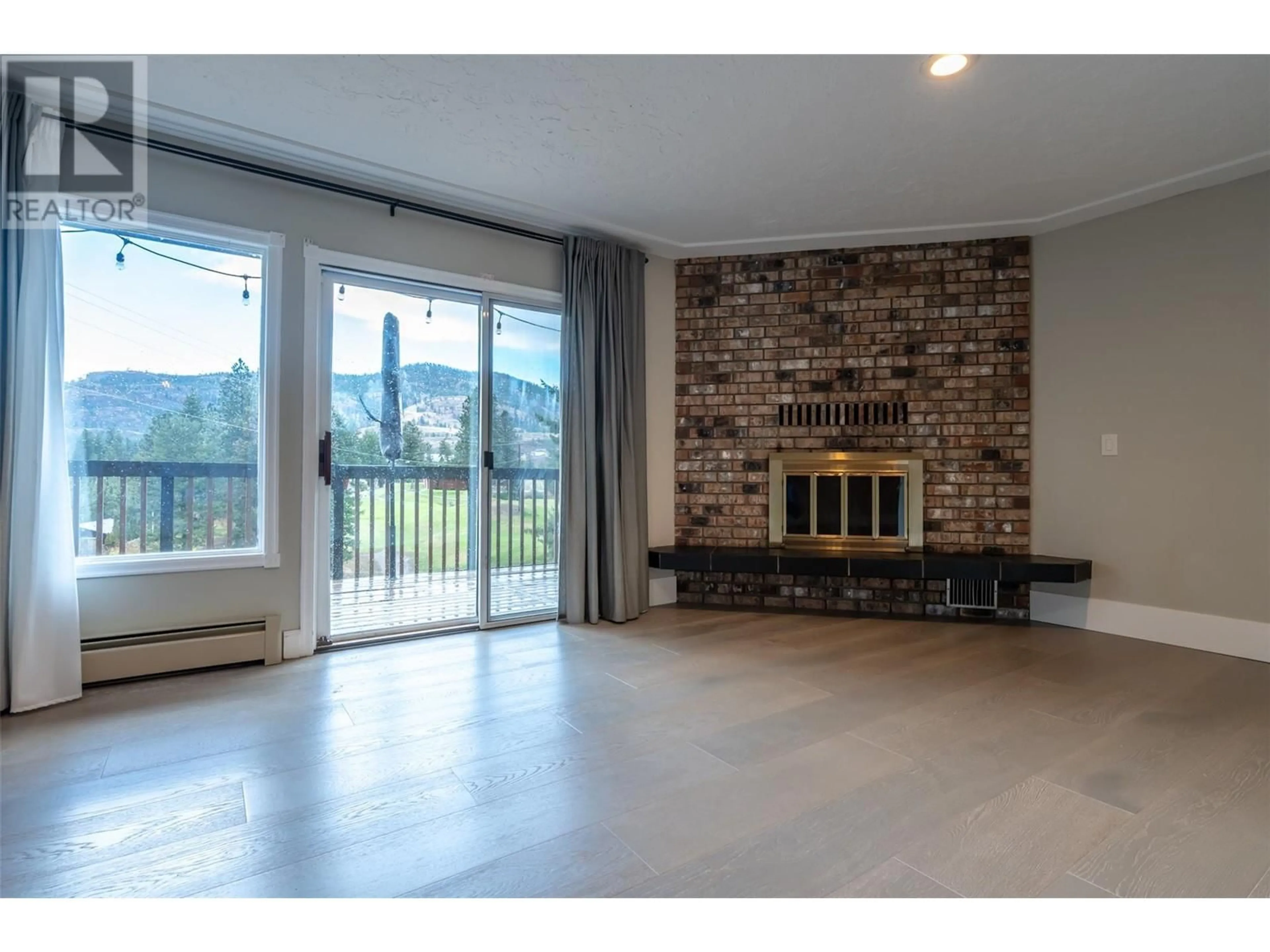 Living room, wood floors for 144 SUMAC RIDGE Drive Unit# 11, Summerland British Columbia V0H1Z6