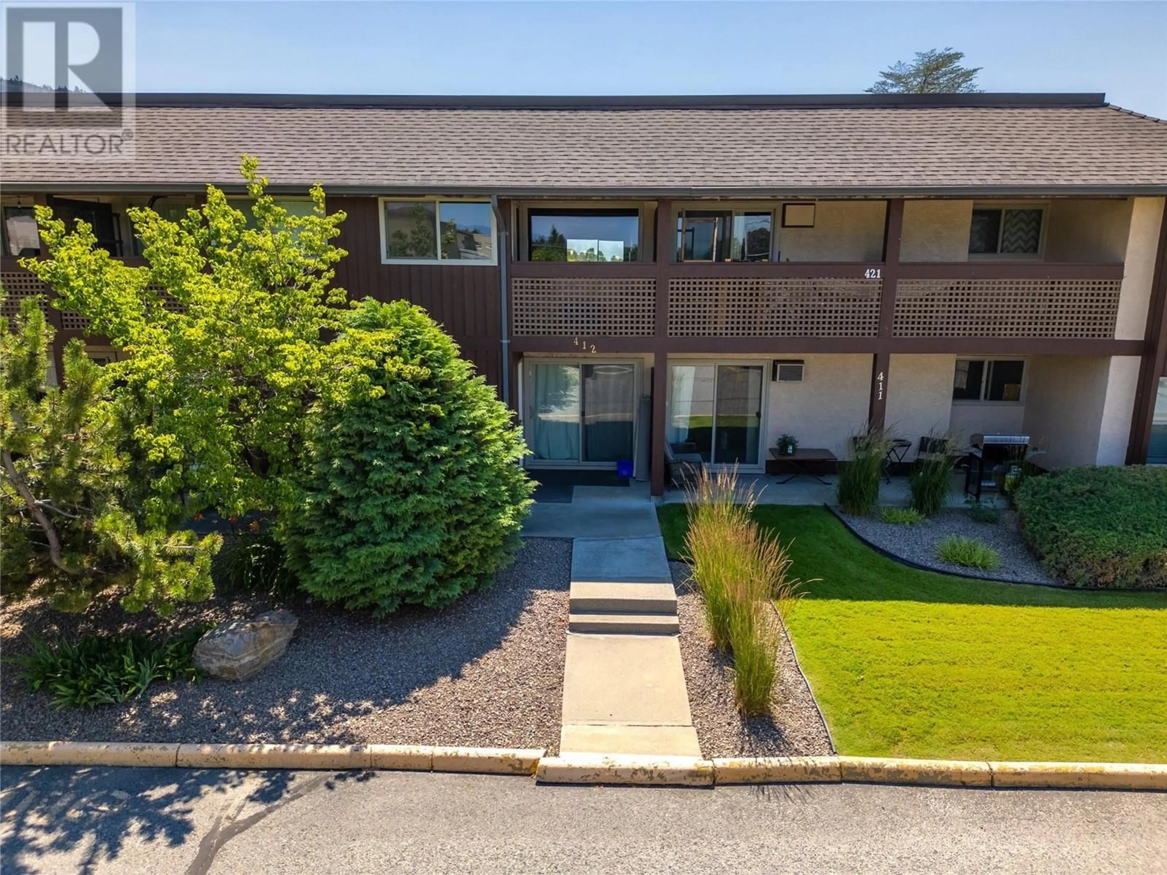 A pic from outside/outdoor area/front of a property/back of a property/a pic from drone, mountain view for 3140 Wilson Street Unit# 412, Penticton British Columbia V2A3T7