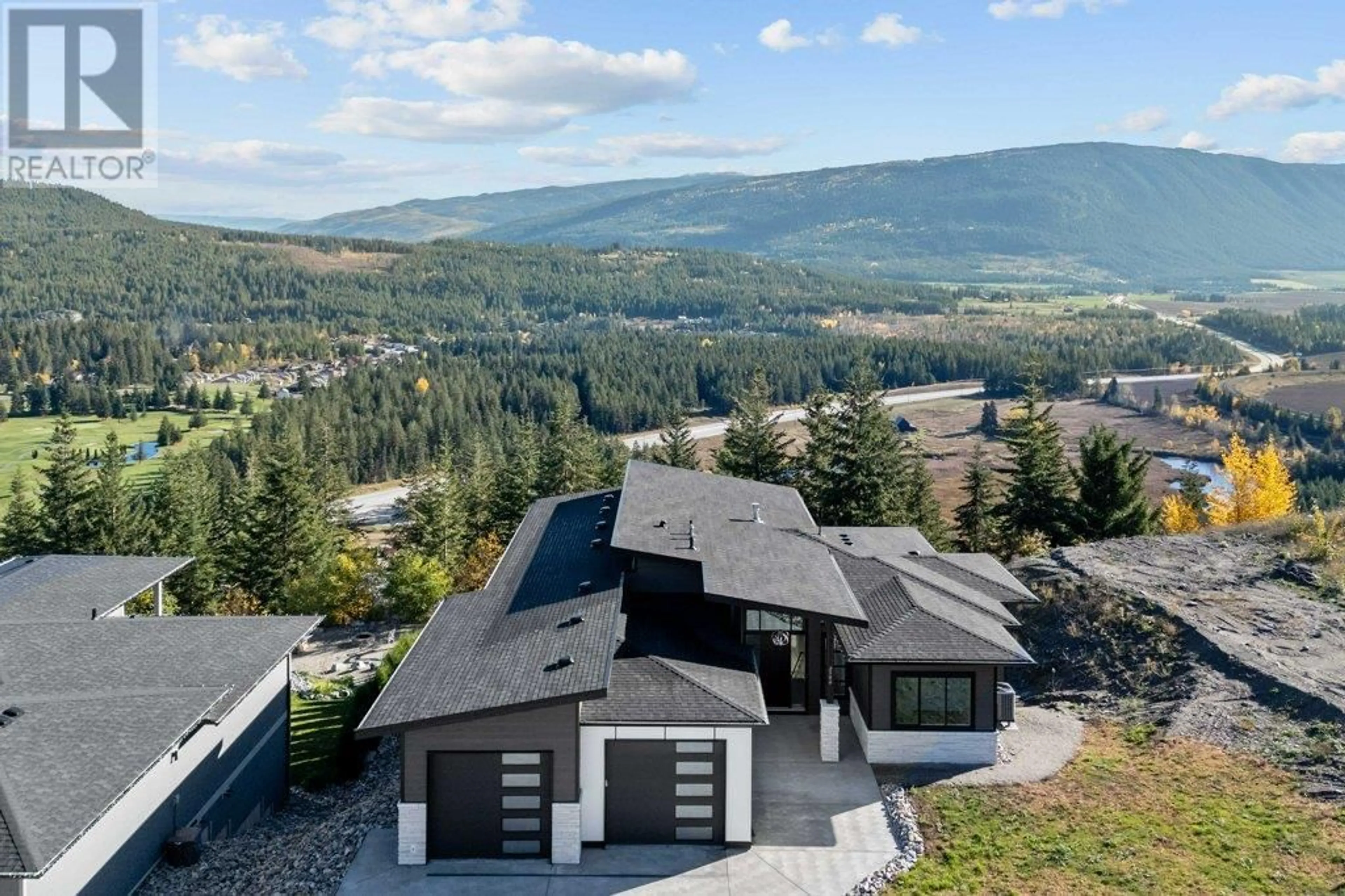 A pic from outside/outdoor area/front of a property/back of a property/a pic from drone, mountain view for 2506 HIGHLANDS DRIVE, Blind Bay British Columbia V0E1H2