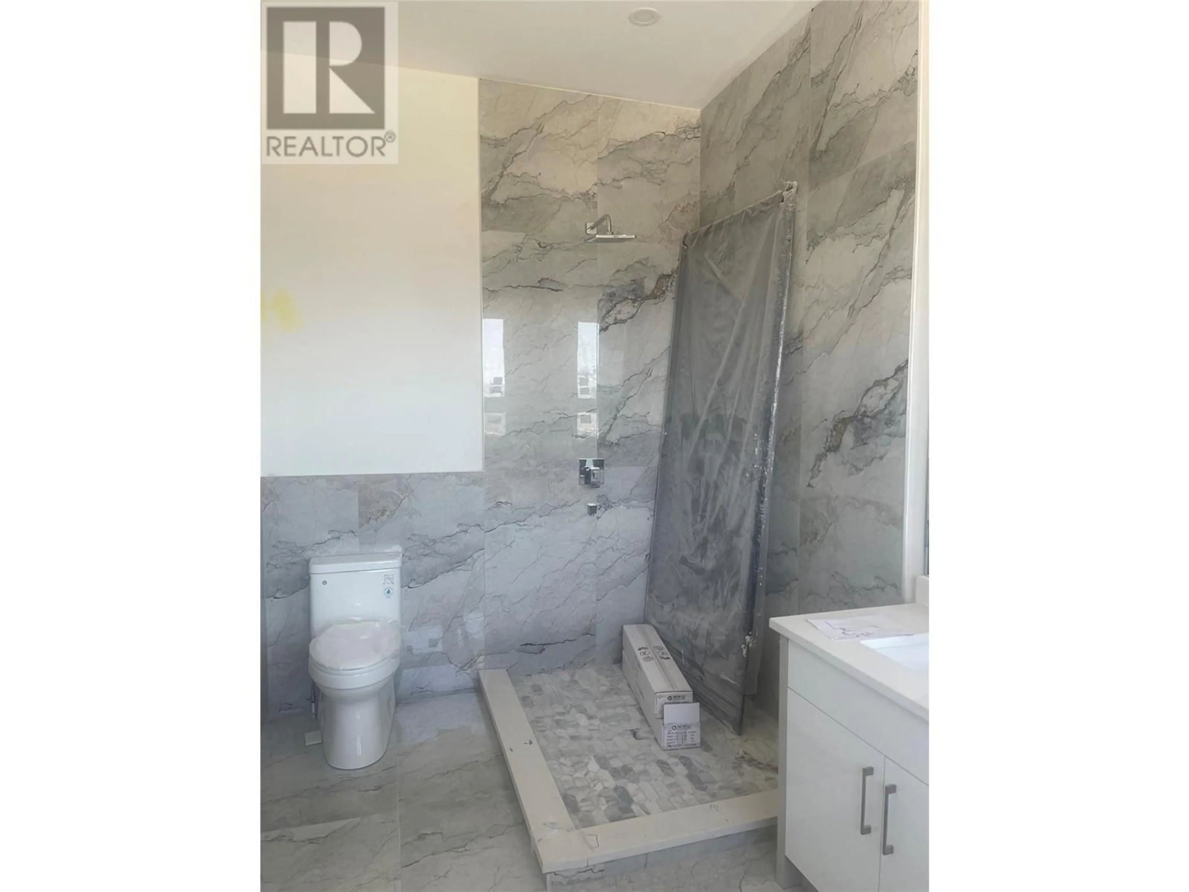 Contemporary bathroom, cement floor for 2231 Lavetta Drive, Kelowna British Columbia V1P1R3