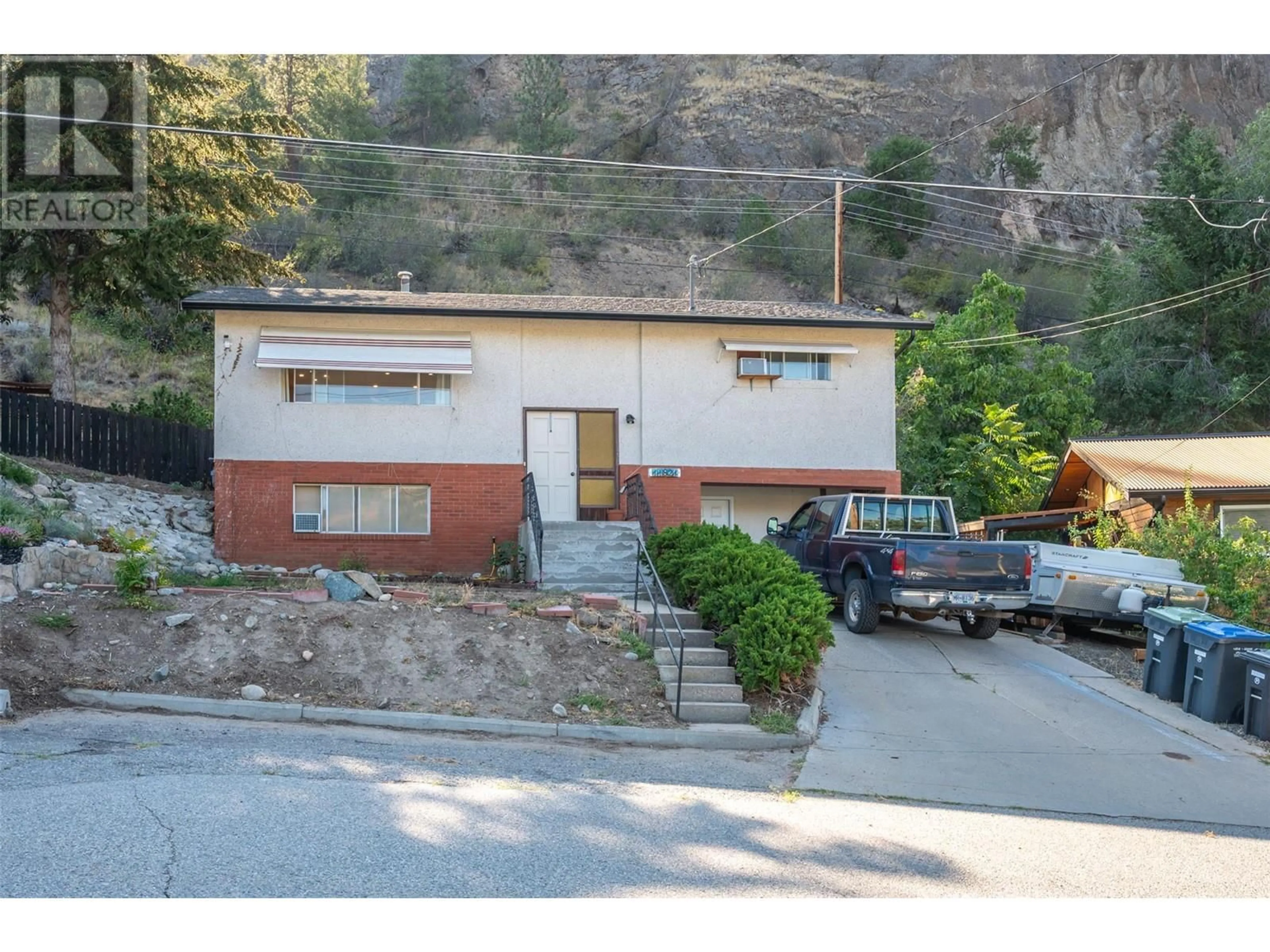 Frontside or backside of a home, the street view for 11821 Read Crescent, Summerland British Columbia V0h1z2