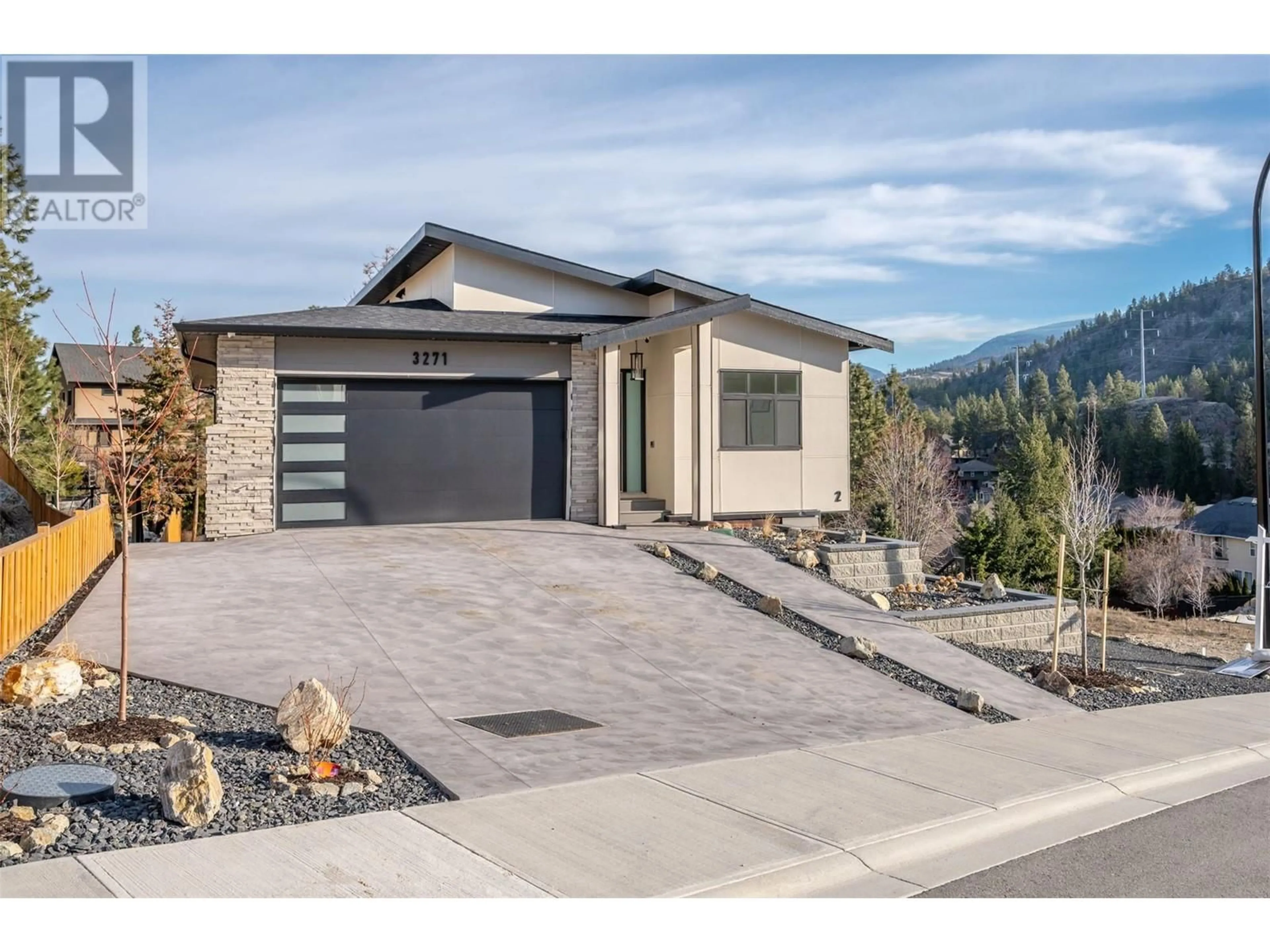 Frontside or backside of a home, the street view for 3271 Evergreen Drive, Penticton British Columbia V2A9A9