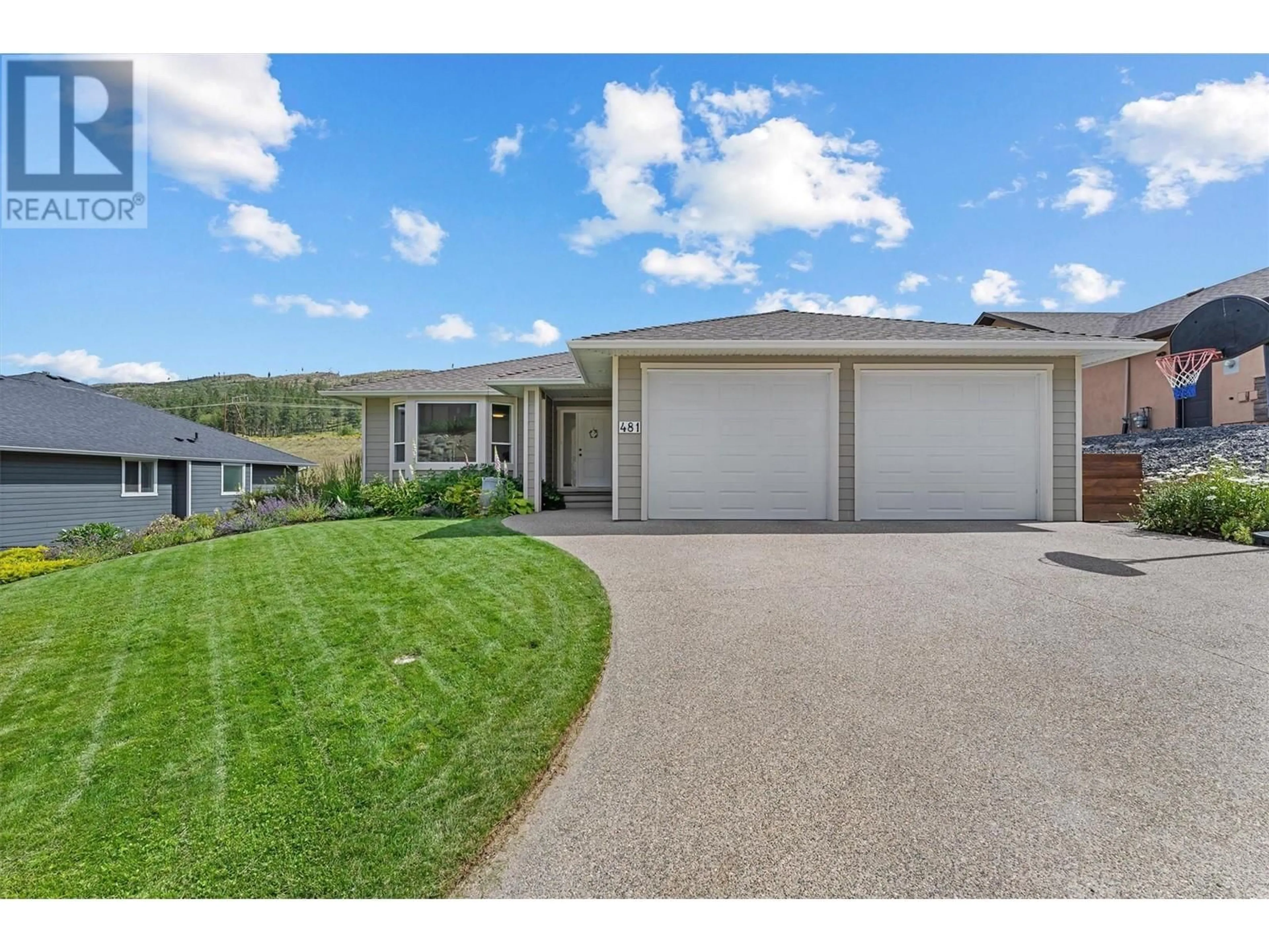 Frontside or backside of a home, the street view for 481 Swan Drive, Kelowna British Columbia V1W5J5