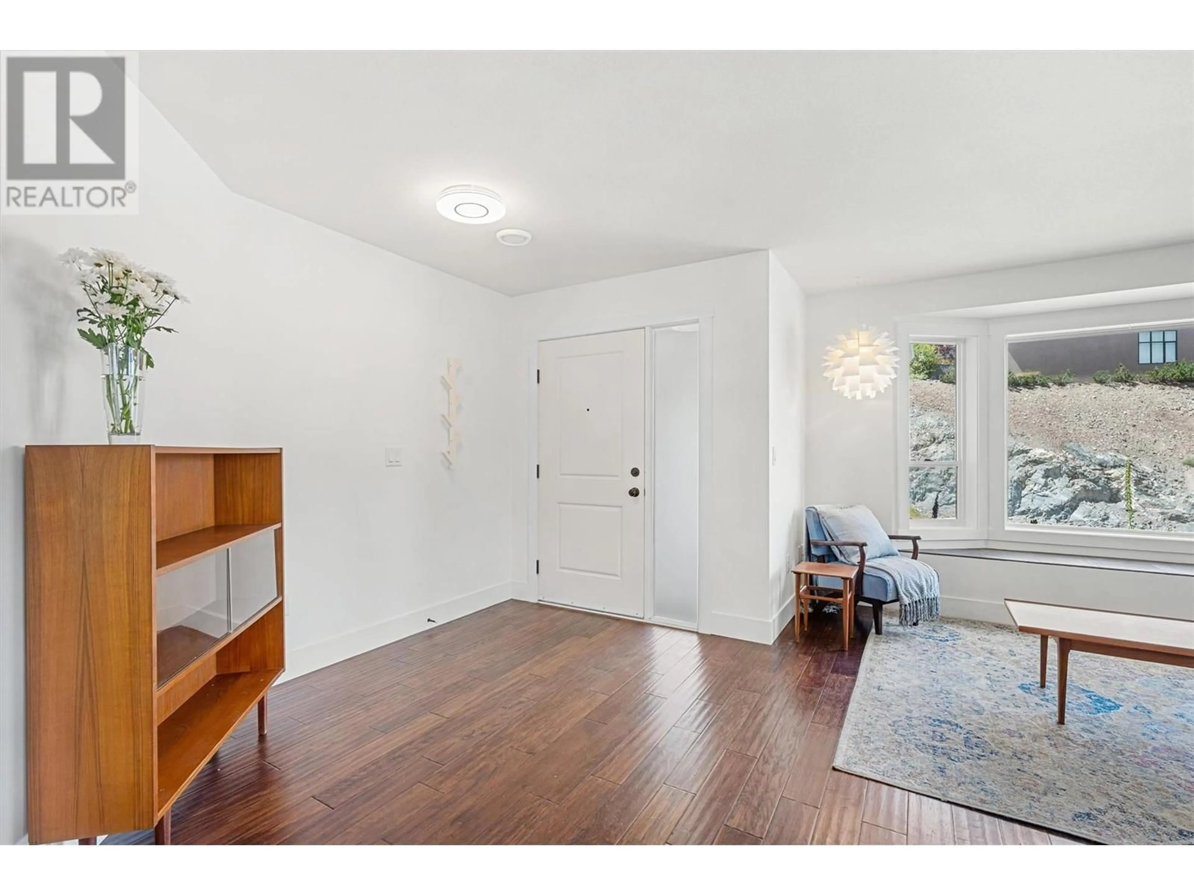 Indoor entryway, wood floors for 481 Swan Drive, Kelowna British Columbia V1W5J5