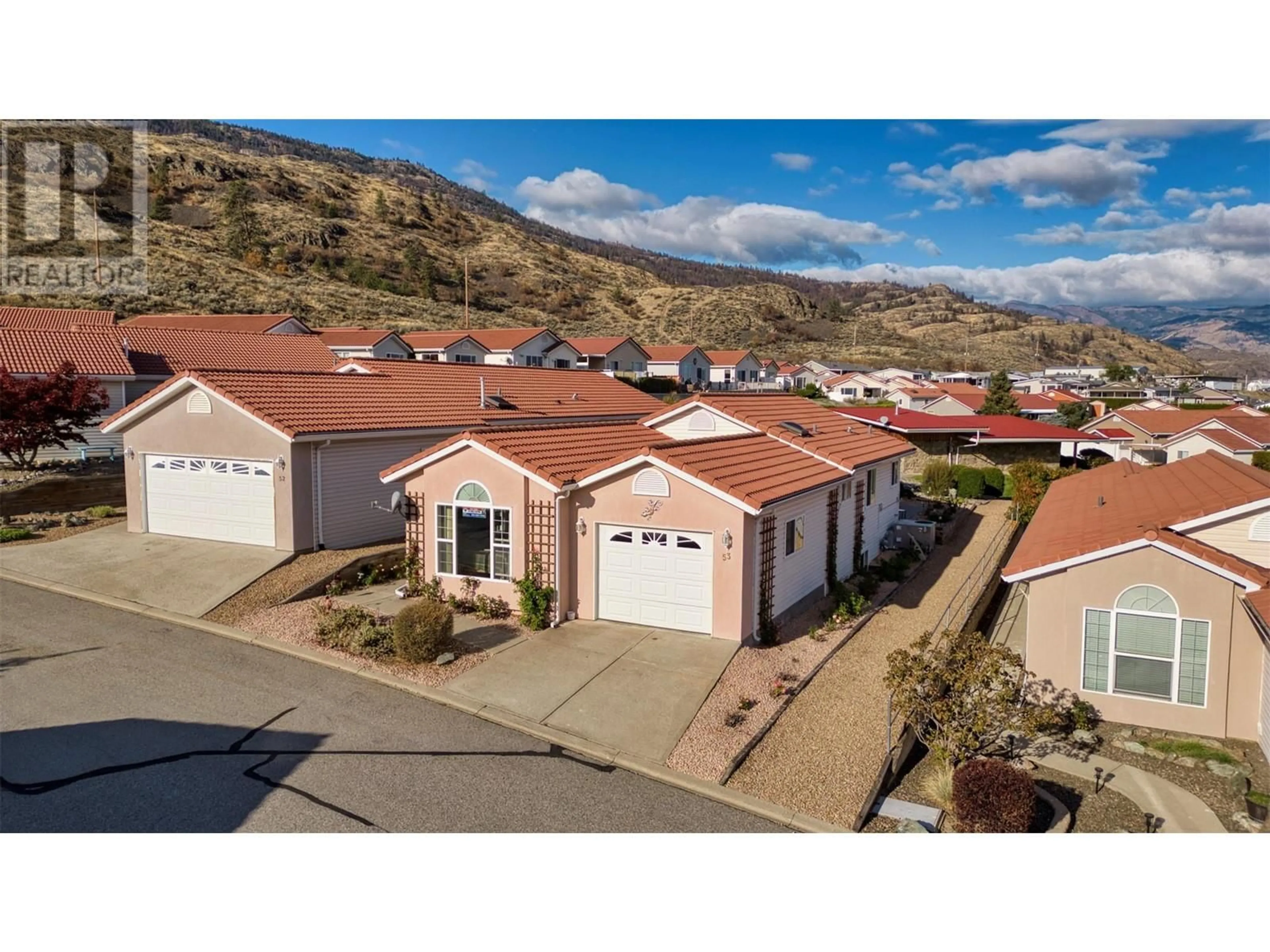 A pic from outside/outdoor area/front of a property/back of a property/a pic from drone, mountain view for 53 - 9400 115TH STREET, Osoyoos British Columbia V0H1V5