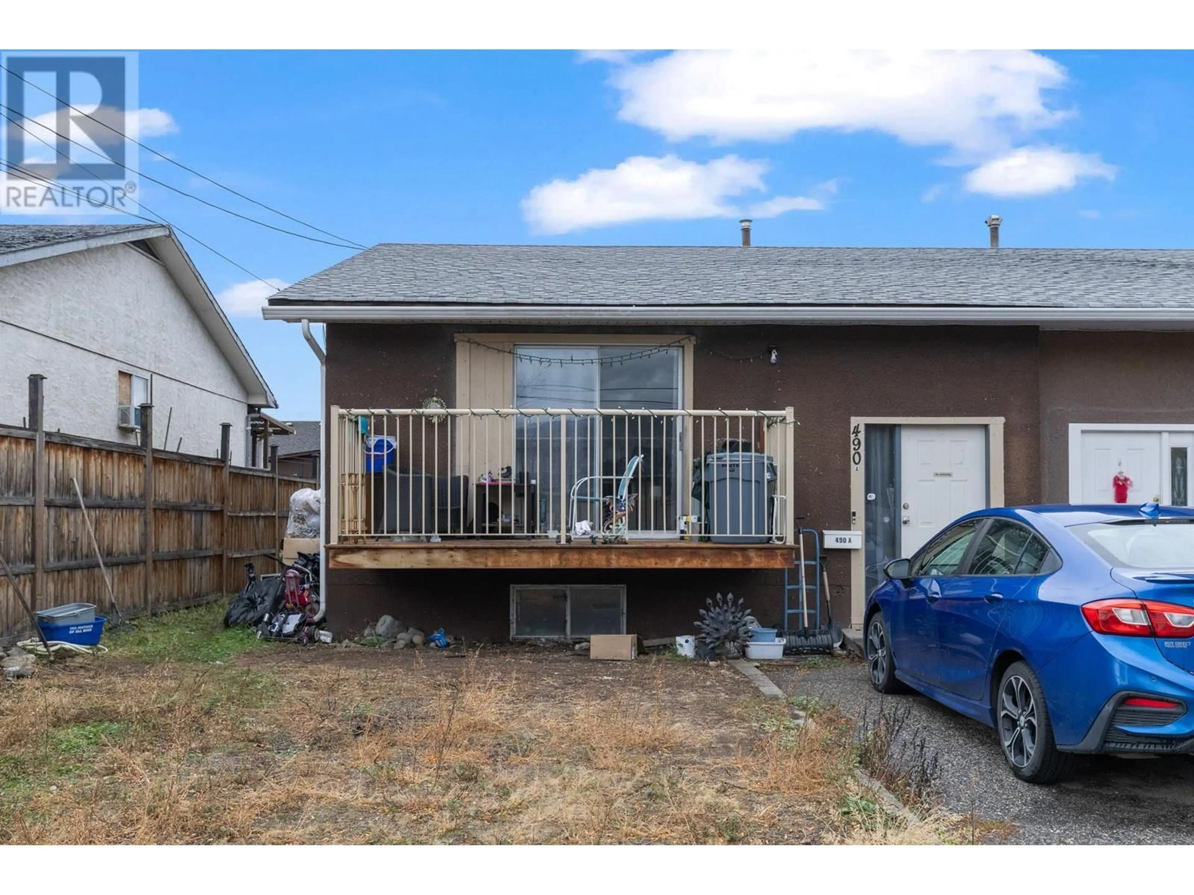 Frontside or backside of a home, the fenced backyard for 490A Hein Road Lot# 4, Kelowna British Columbia V1X4A3