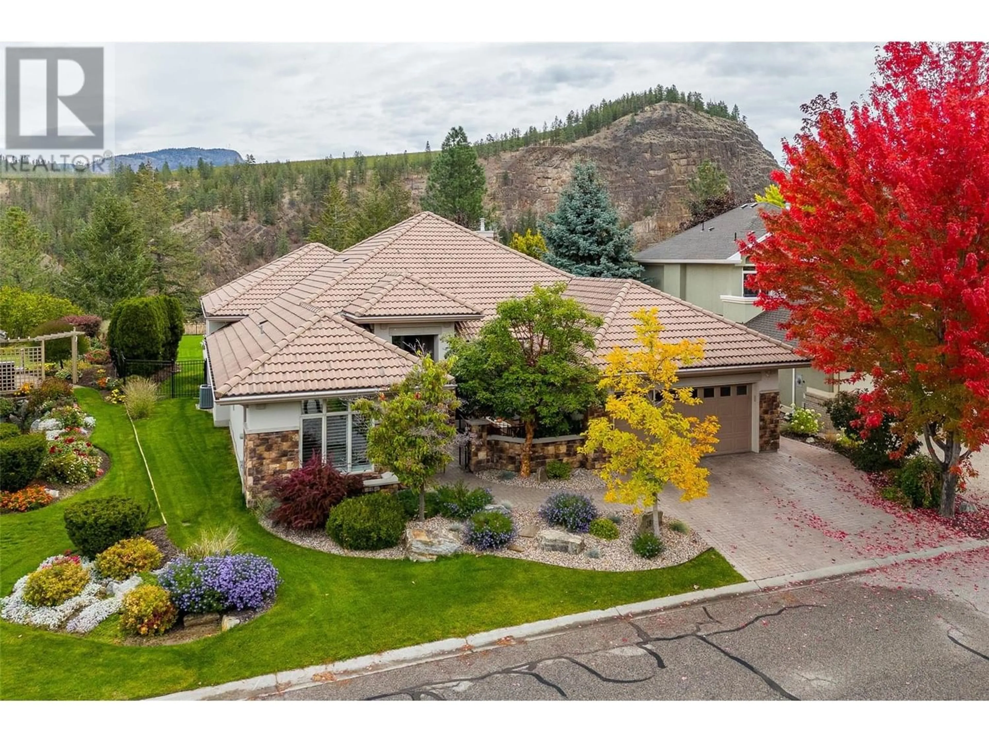 Frontside or backside of a home, the street view for 3813 Gallaghers Parkway, Kelowna British Columbia V1W3Z8