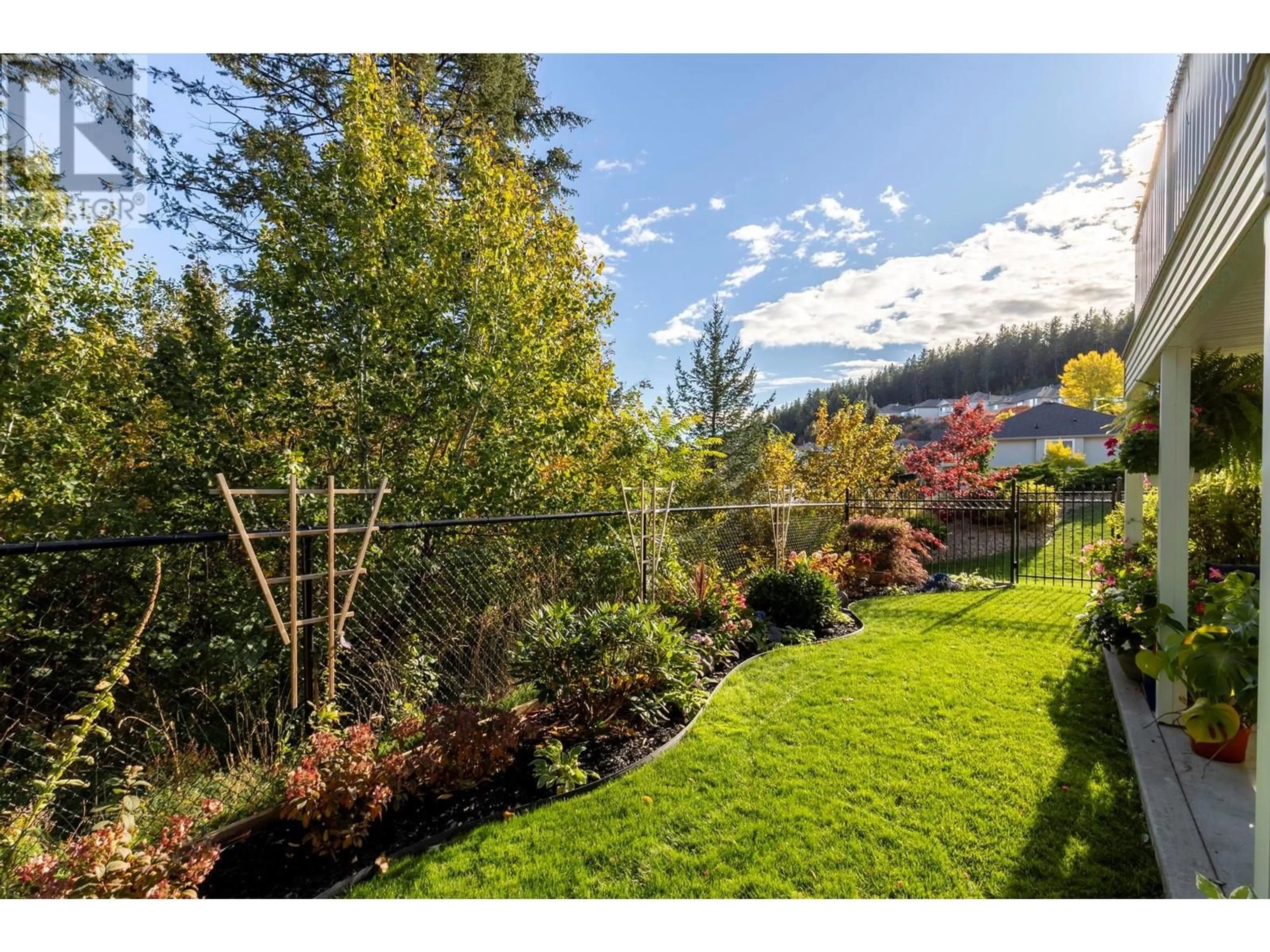 Patio, the fenced backyard for 3642 Yorkton Road, West Kelowna British Columbia V4T2X2